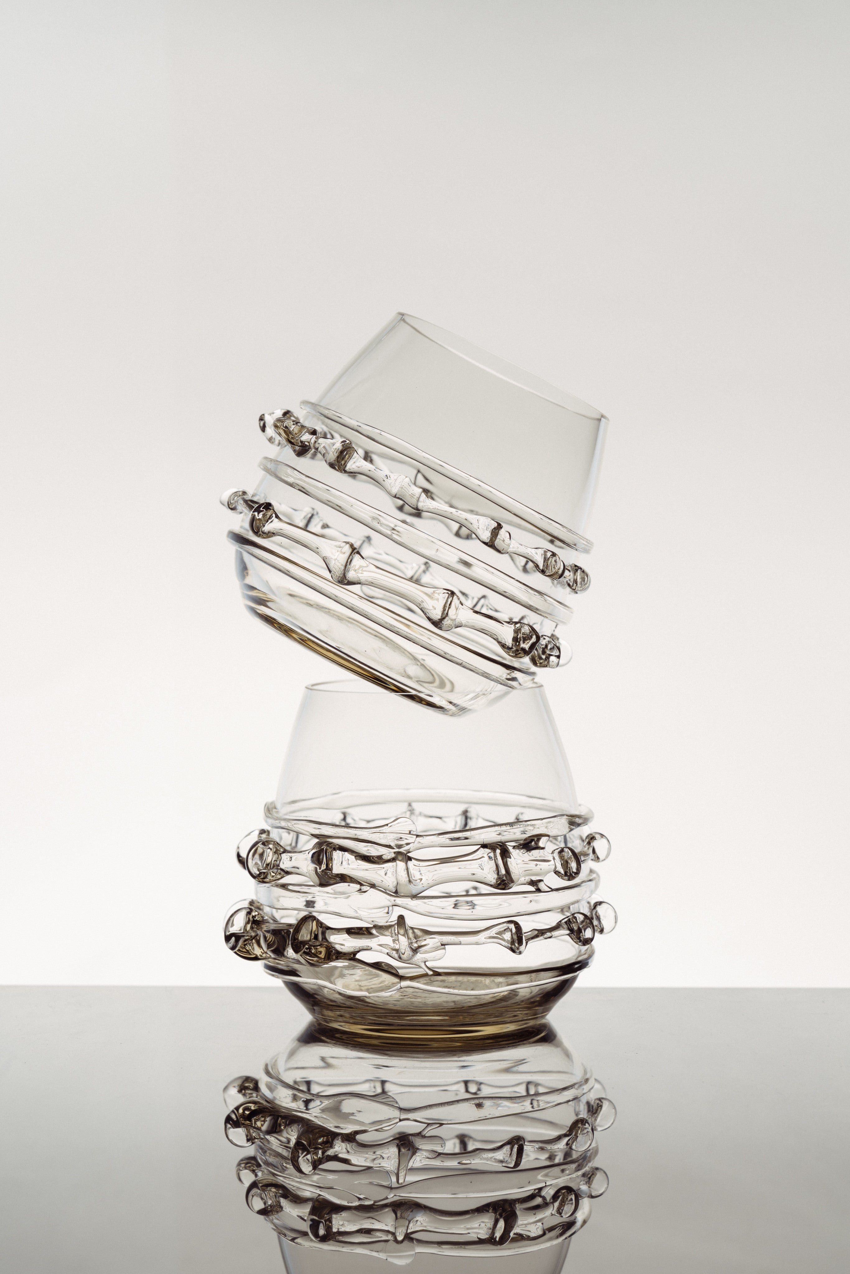 Contemporary Tumblr - Set of Two Handblown Glass Vessels — stacked view highlighting clear glass texture