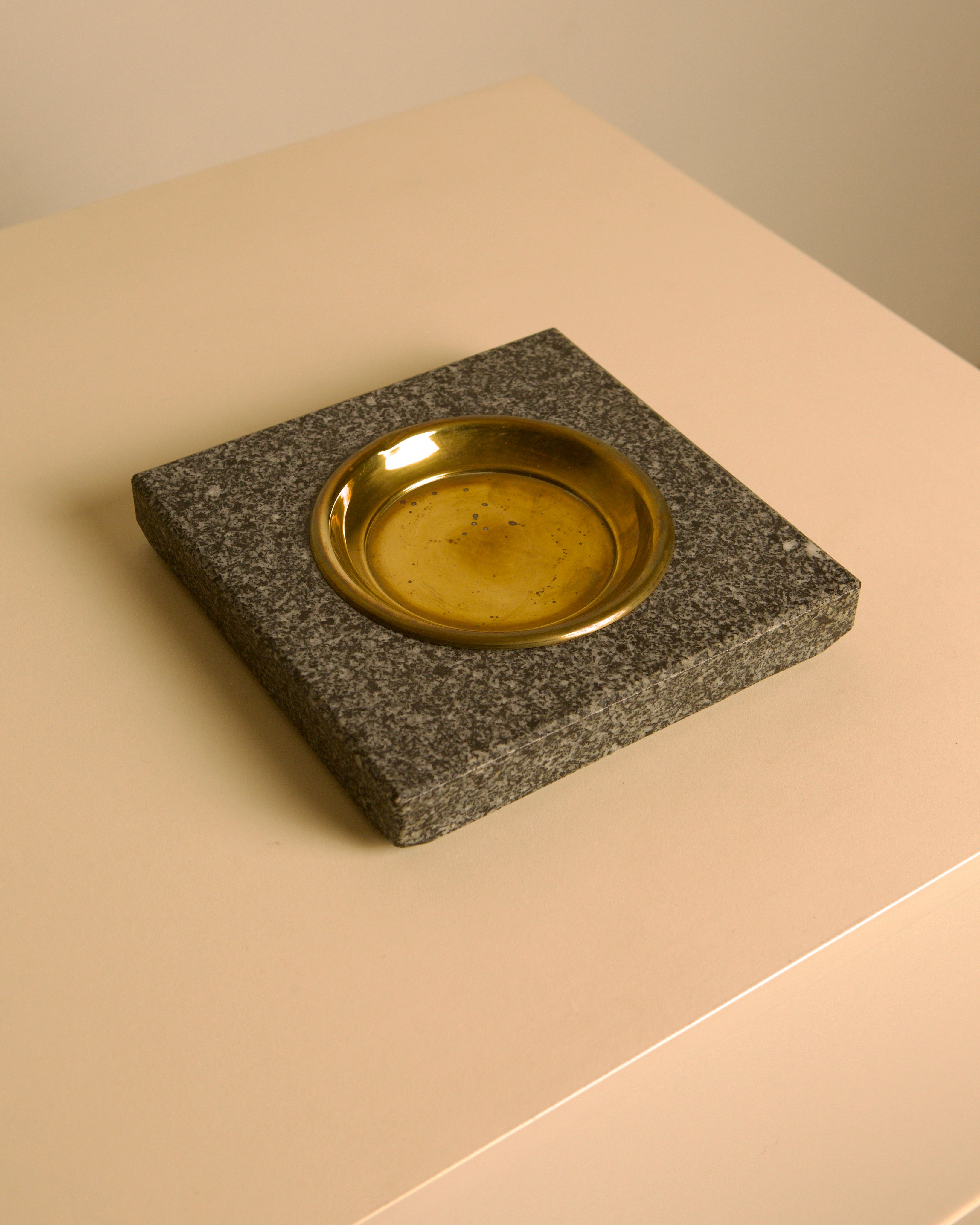 Italian granite and brass vide-poche, 1960s  — side angle