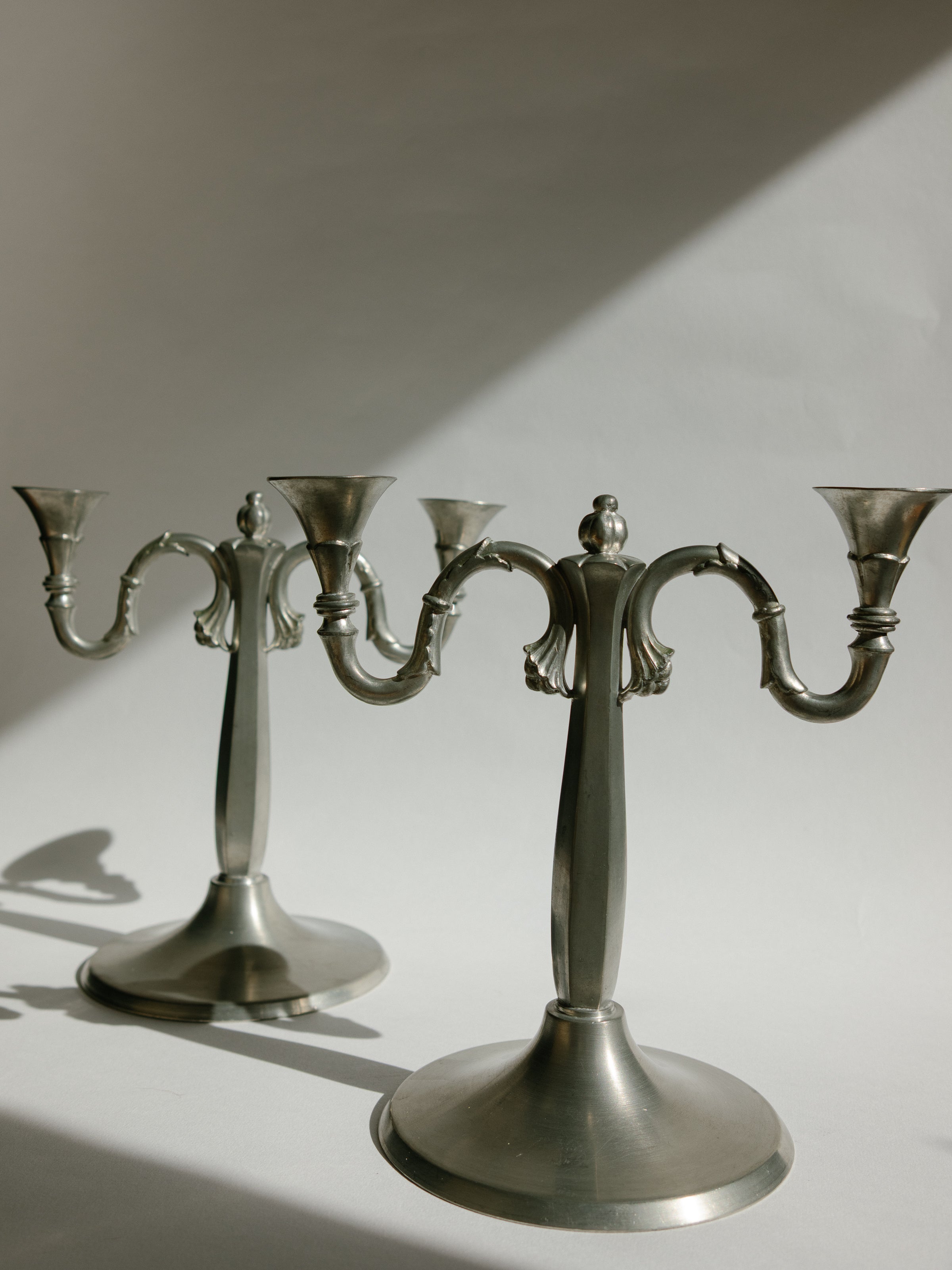 Pair of Harald Linder for Svenskt Tenn Swedish Grace Pewter Candelabra - 1930 — side angle
