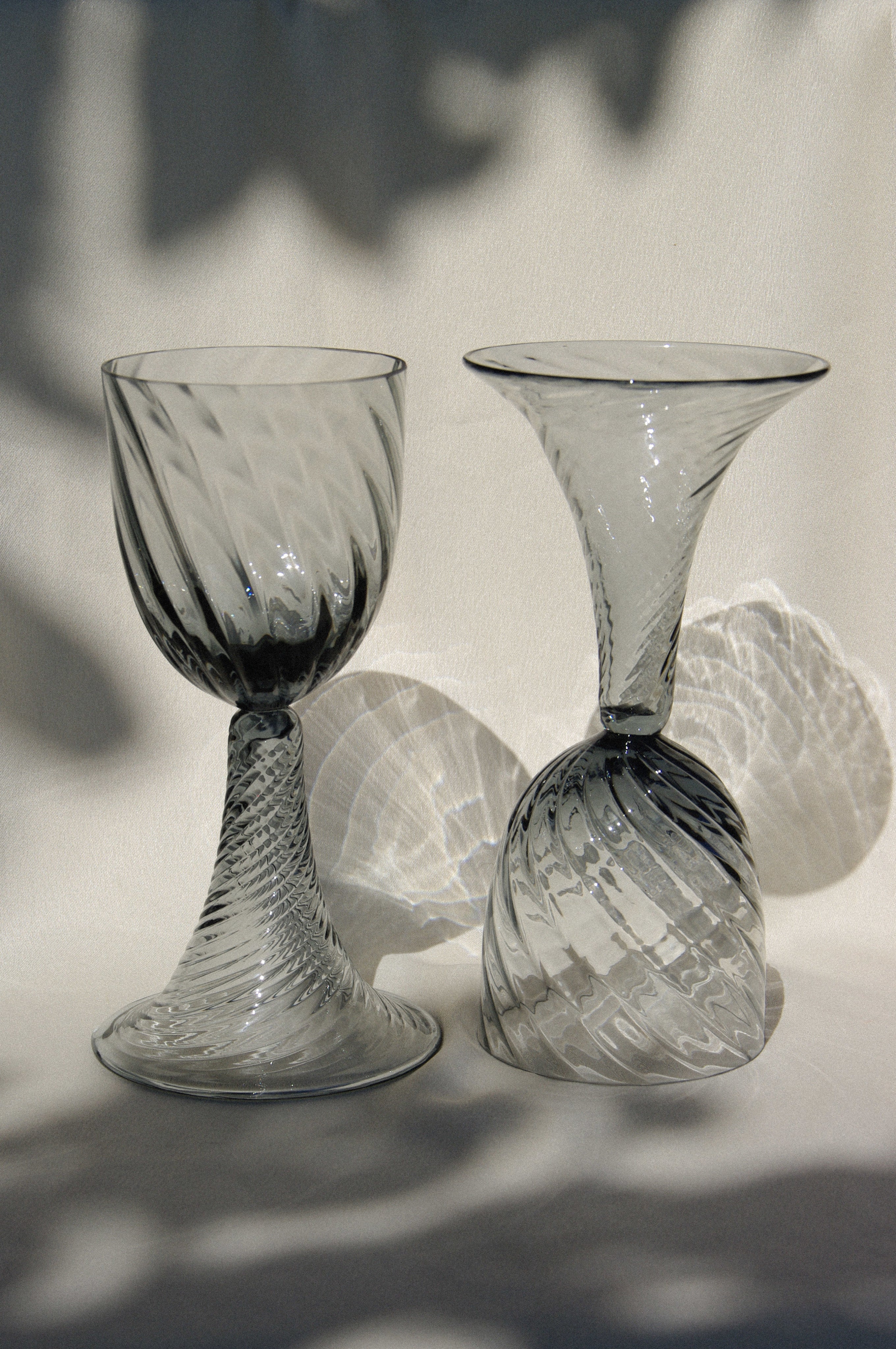 Pair of Mouthblown Wine Goblets in glass — top view showing twisted glass design