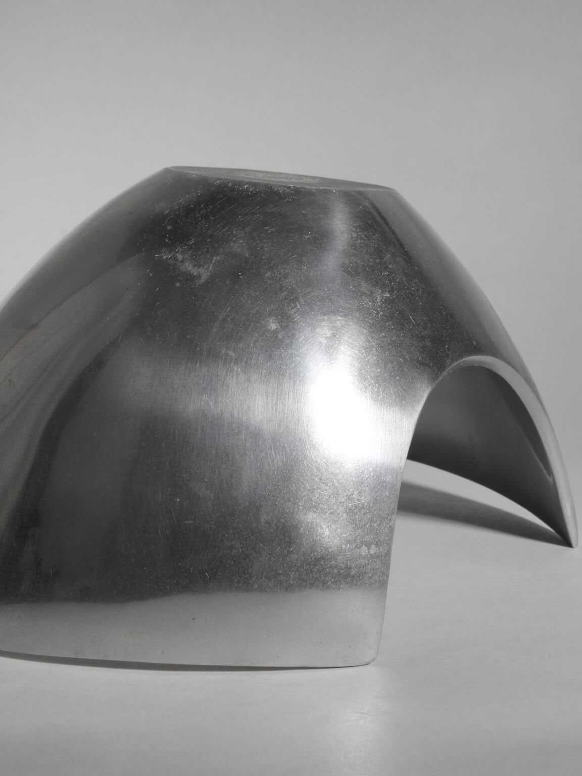 Polished Aluminum Asymmetric Contemporary Deep Bowl, Medium — close-up