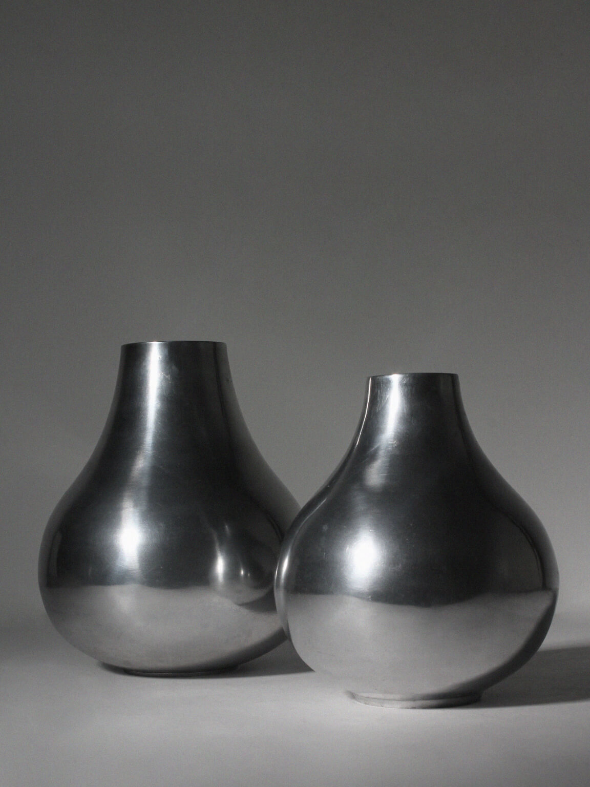 Polished Aluminum Bulbous Vase — close-up