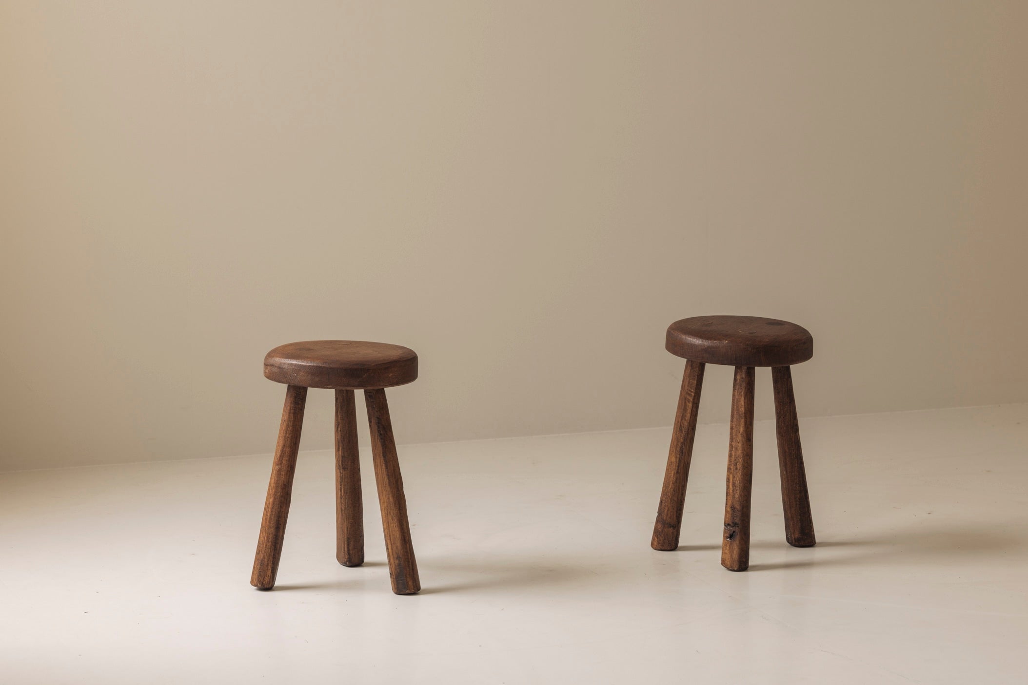 Set of two solid elm tripod stools from France, 1950s — additional view