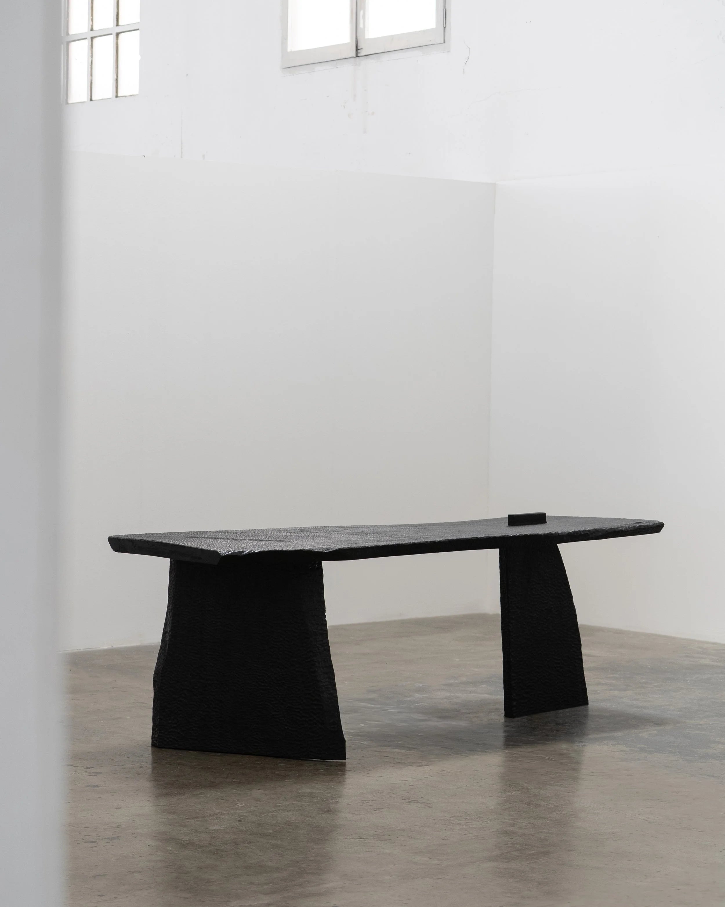 Massif Dining Table from Charred Eucalyptus Wood by Otra Objects | The Oblist