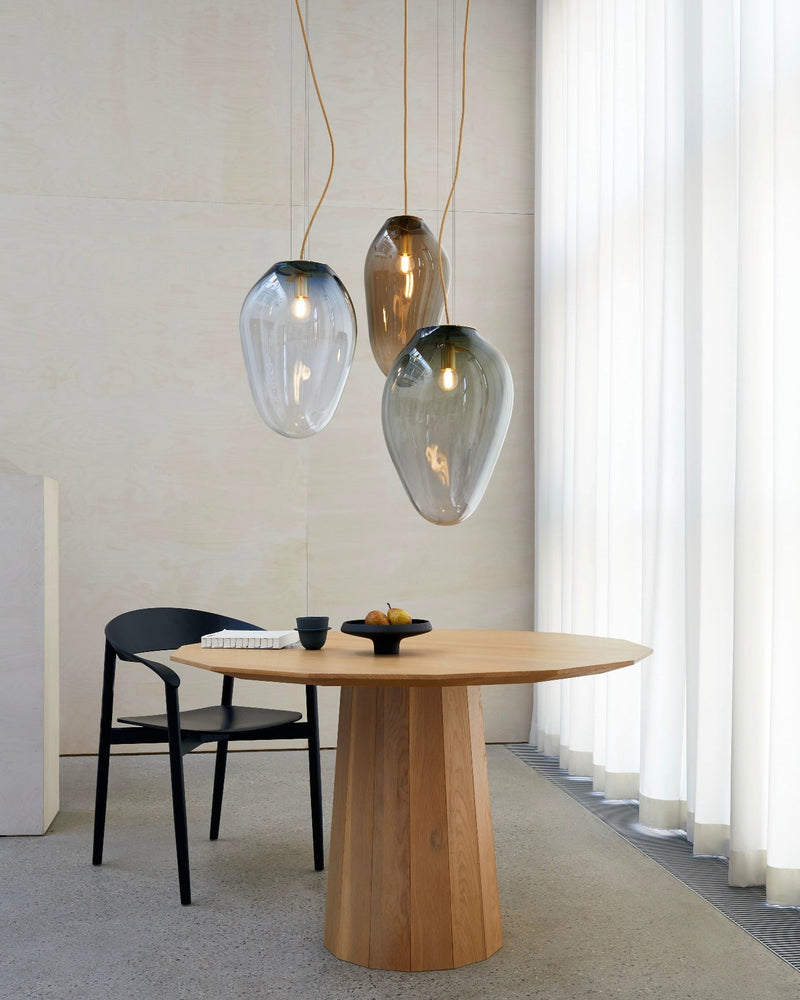 CERES pendant - size M (H:40cm), L (H: 43cm), XL (H:49cm) — close-up of glass shades above wooden table
