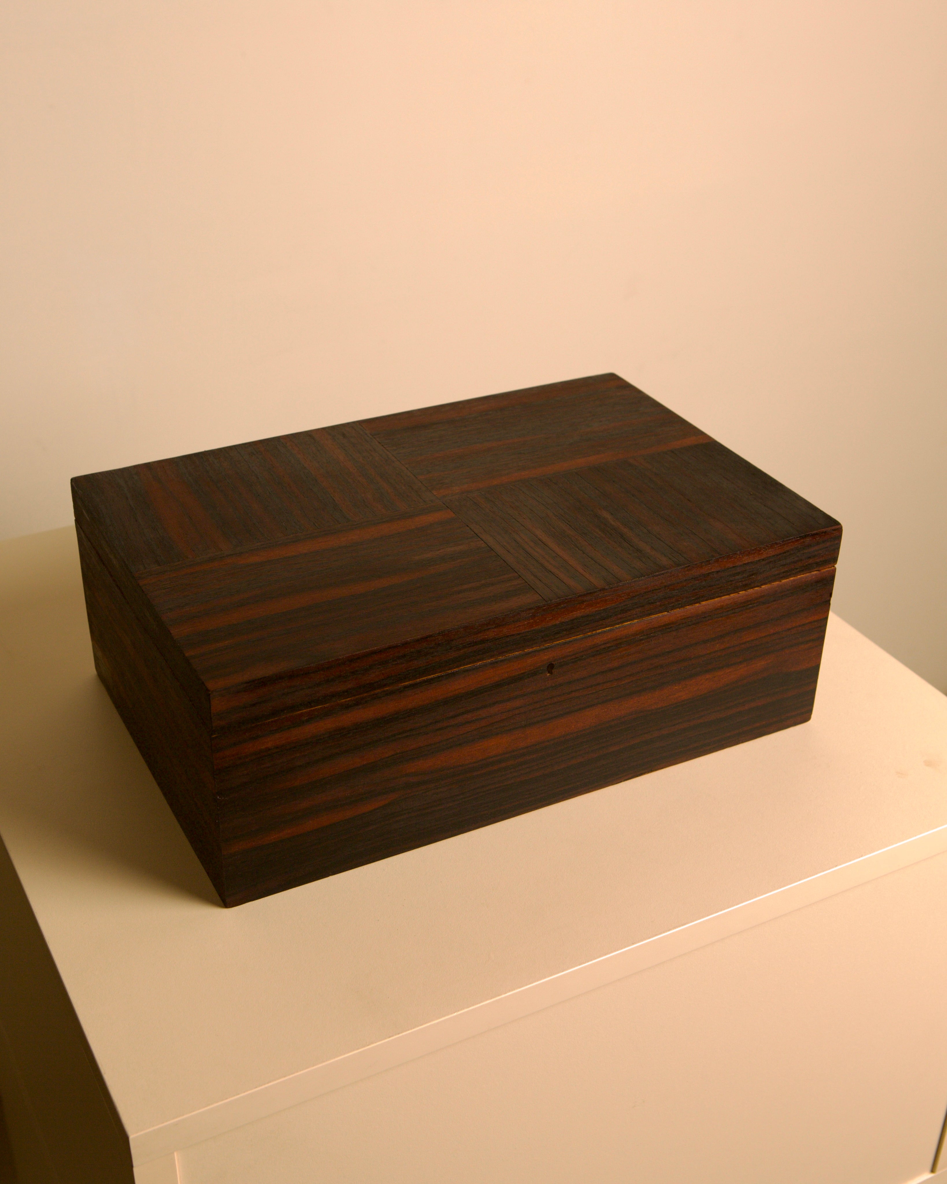 Large Rio rosewood veneer box, Fristho, the Netherlands, 1950s — side angle