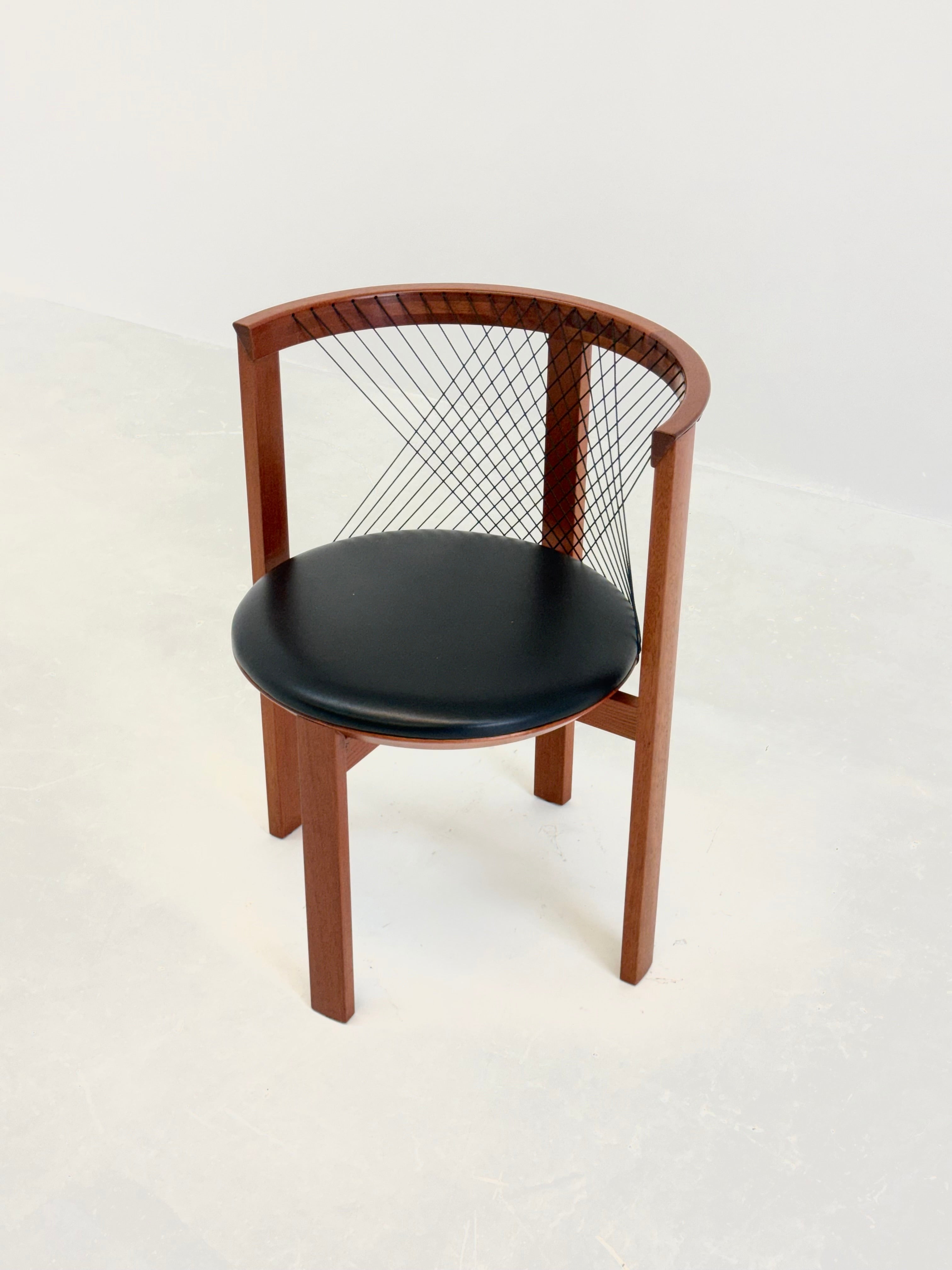 Set of Tranekær String chairs by Niels Jørgen Haugesen — side angle