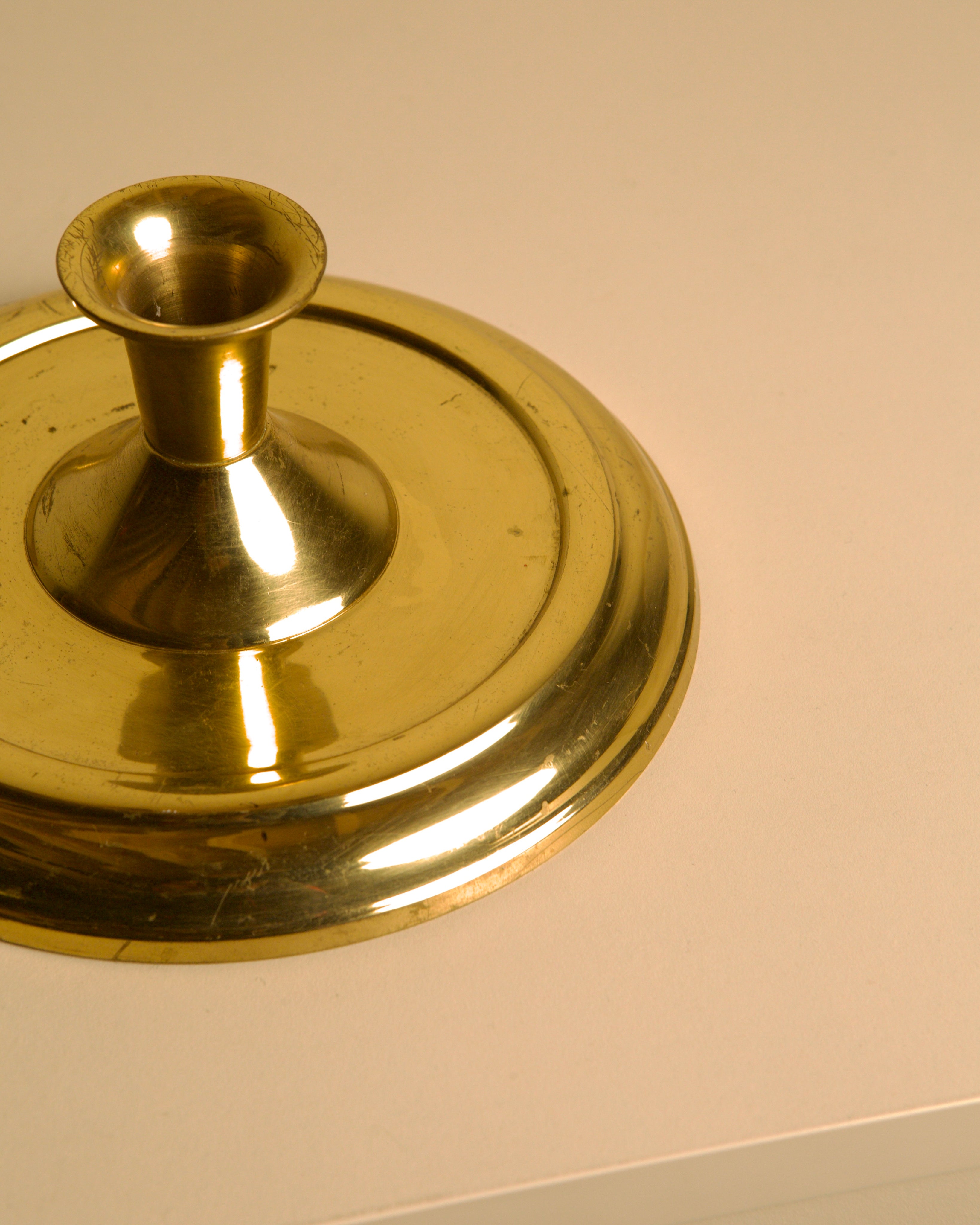 Circular Candleholder in Gold Metal 60's — side angle showing polished gold finish