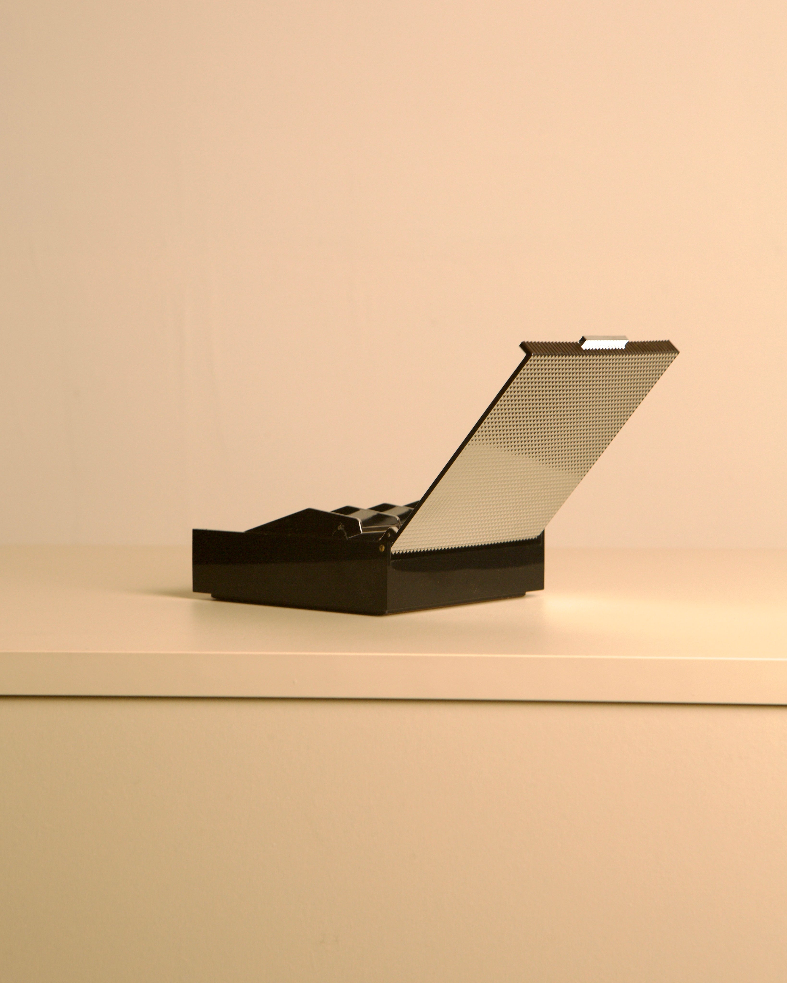 Italian box made of metal and plastic, 80s — top view with lid open