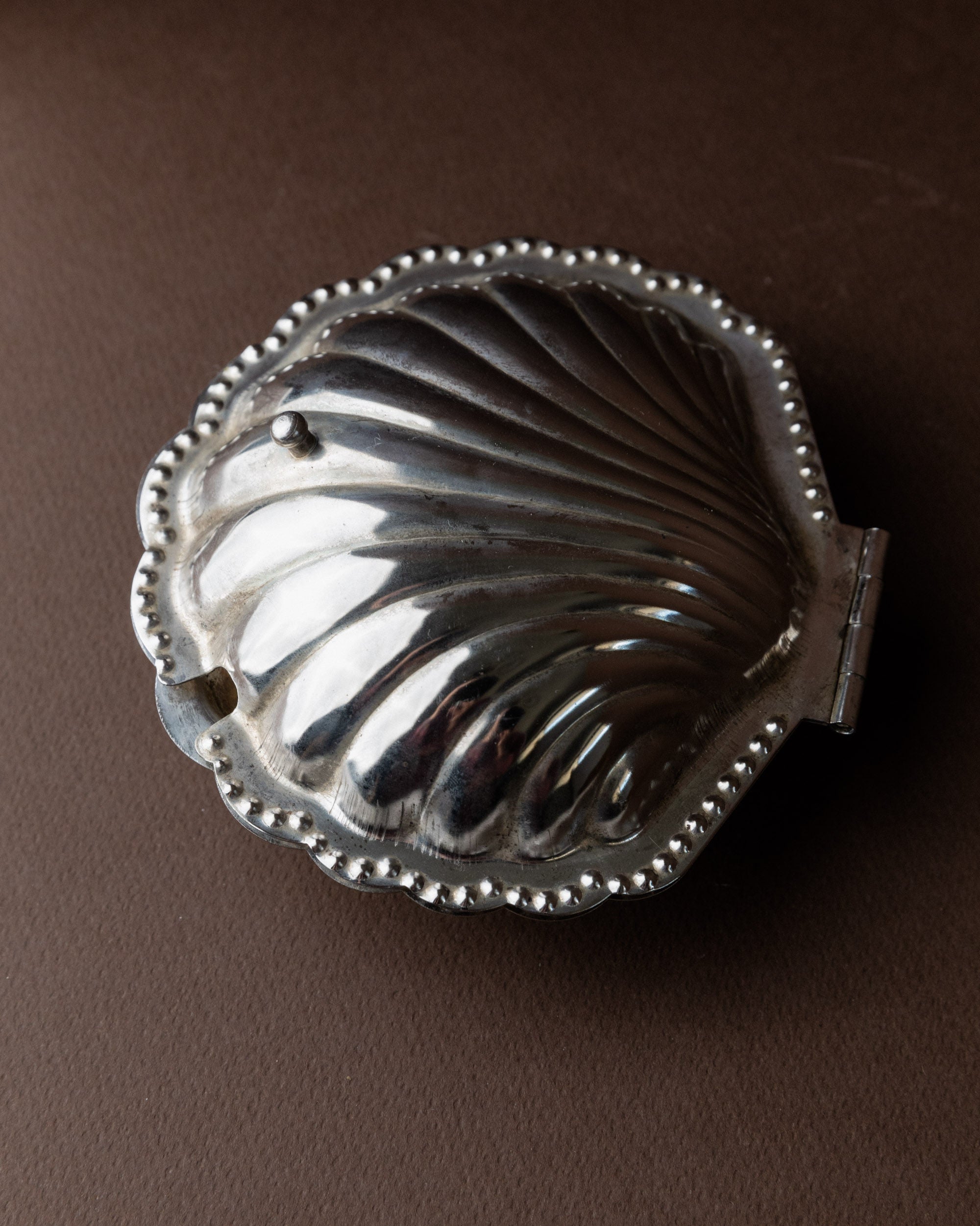 Shell-Shaped Sugar Bowl, Italy 1960s — back view showing polished metal surface