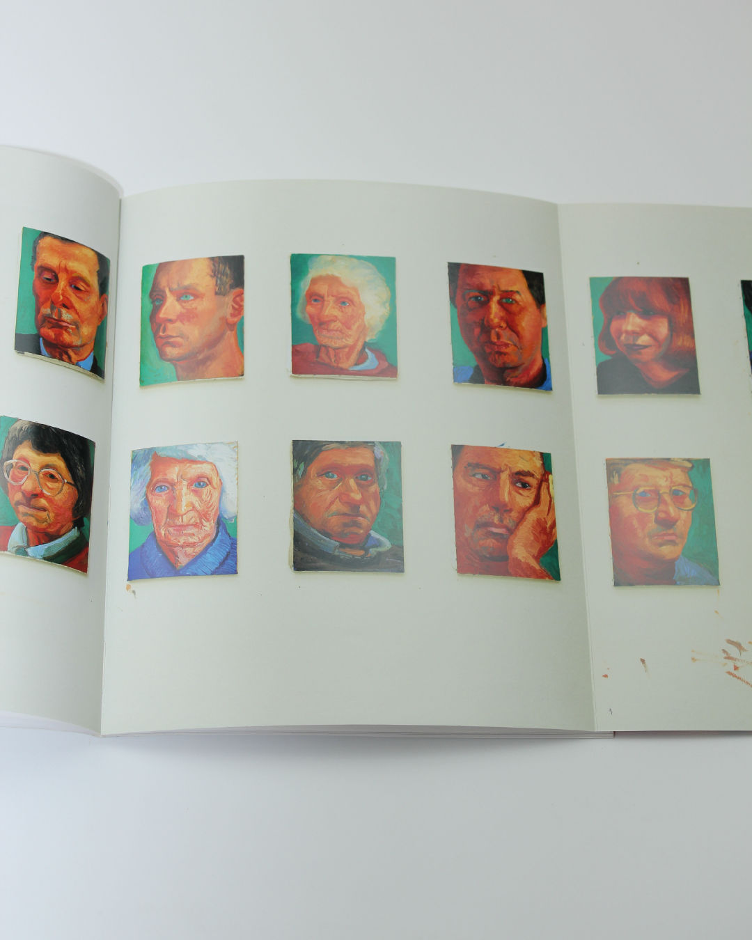 David Hockney: Faces and Spaces Book — open view of colorful portrait illustrations