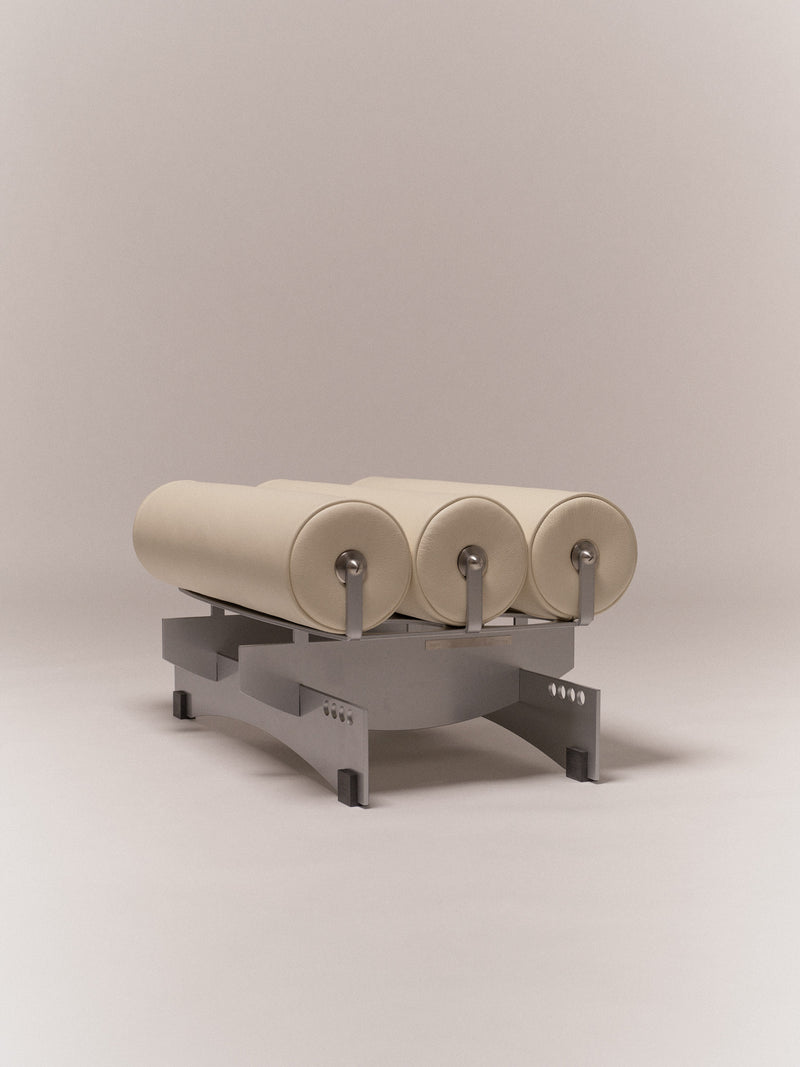 Ottoman Bassa — close-up of cream fabric cushions on metal base