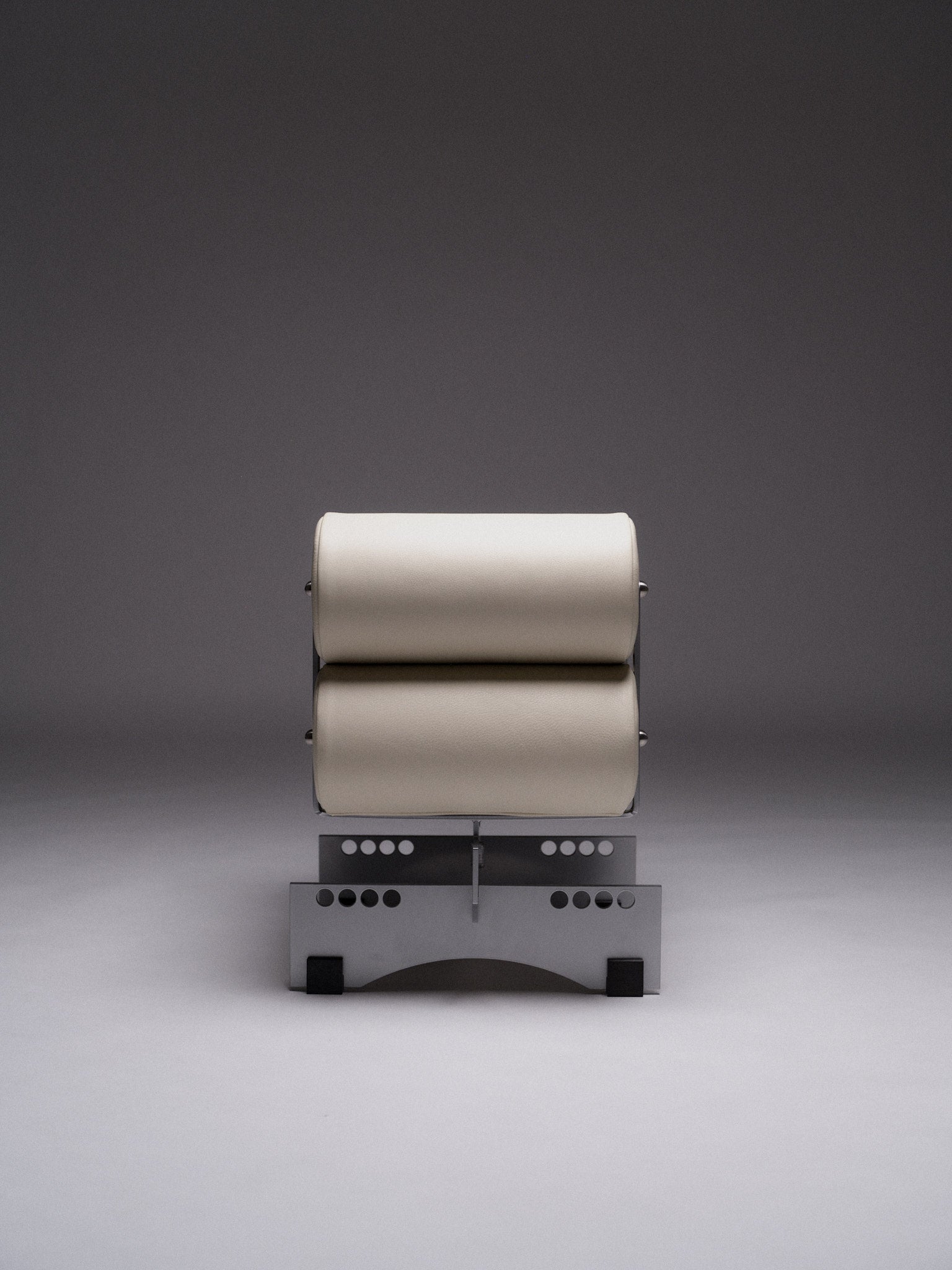 Poggia Alta — back view highlighting cream upholstery and metal base