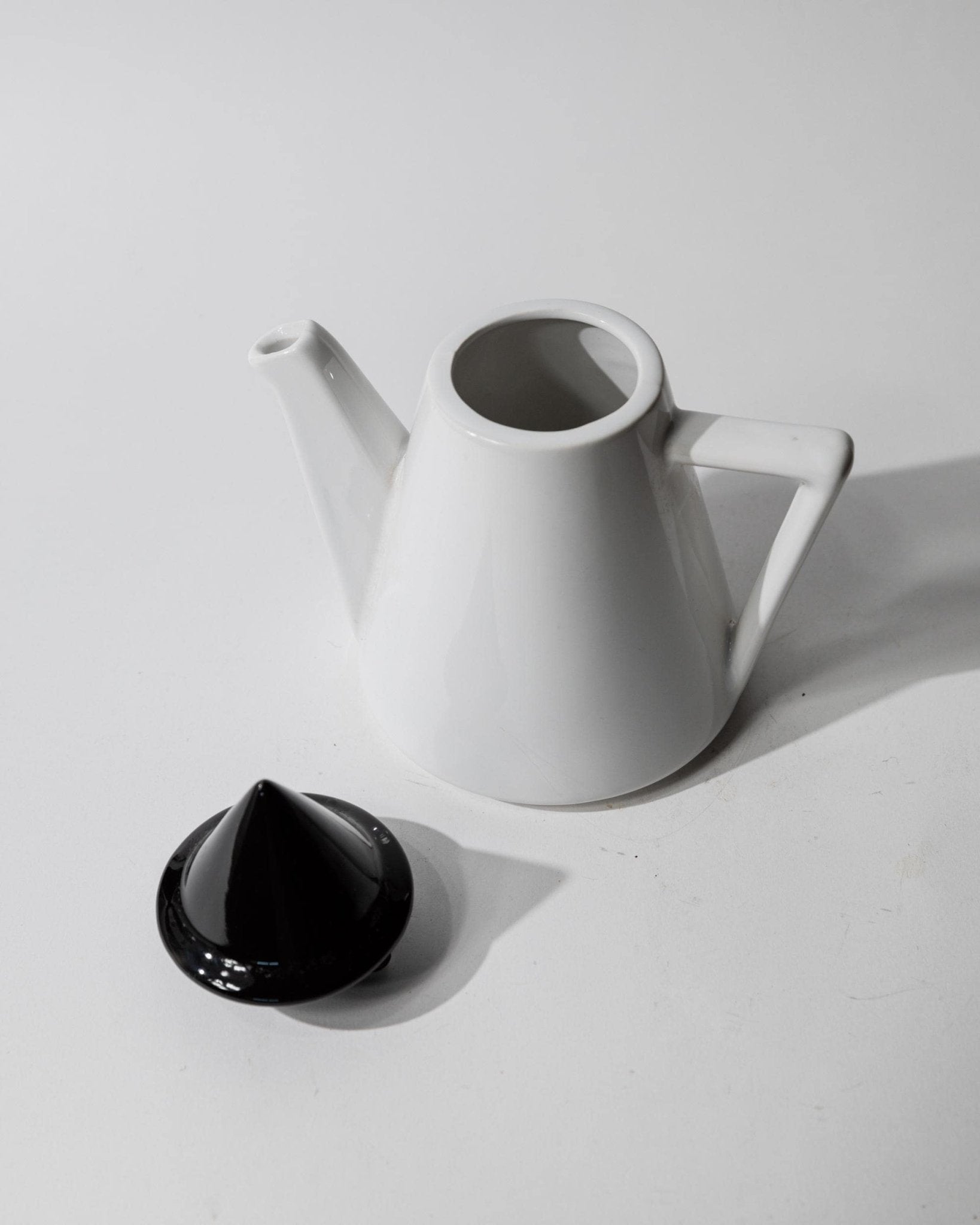 Vintage 1980s Ceramic Coffee or Tea Pot, Memphis Postmodern Design, Black and White Triangle, Sculptural Tableware, Elegant Gift Idea — close-up