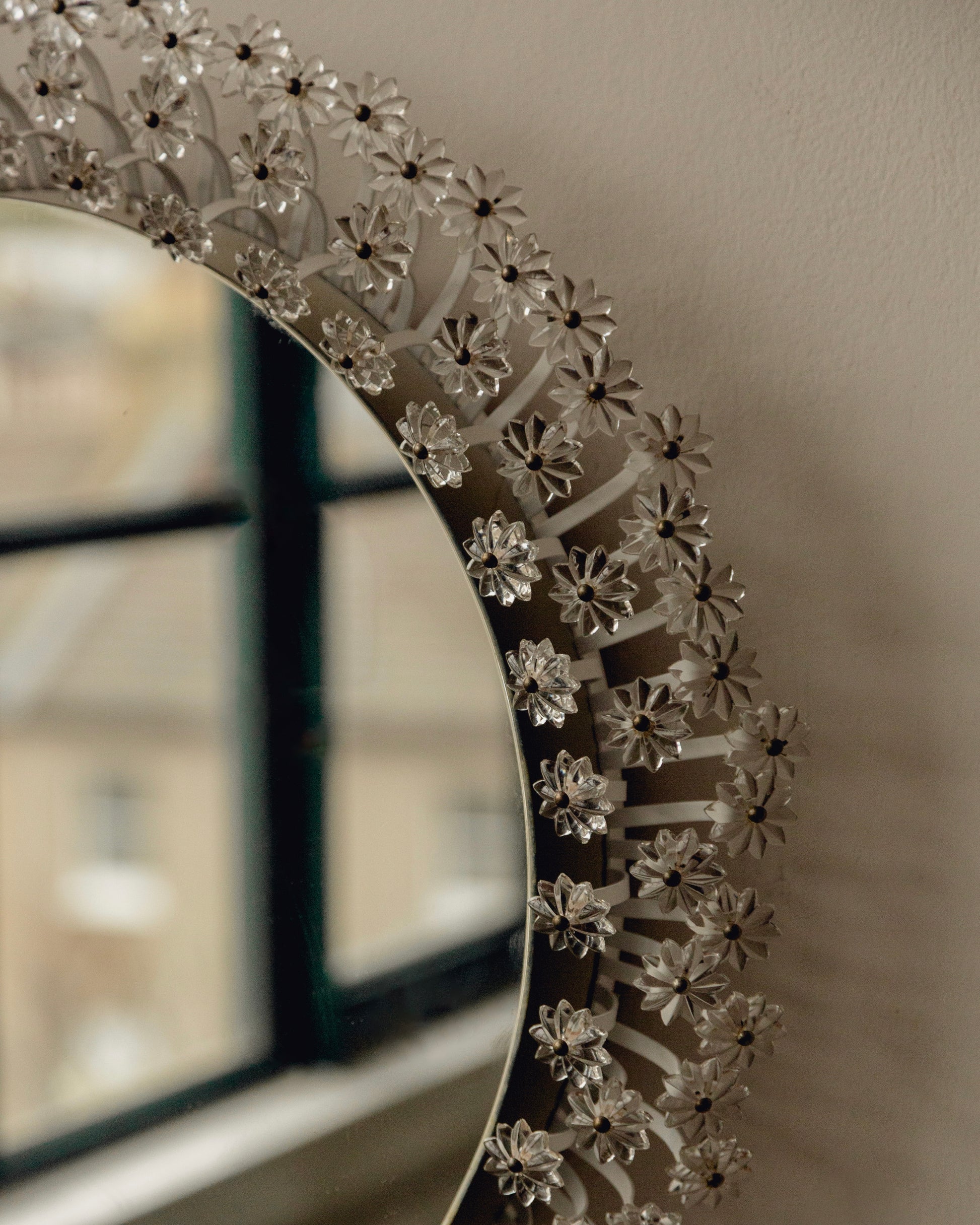 Mid Century Backlit Mirror by Emil Stejner — close-up of floral detail on mirror frame