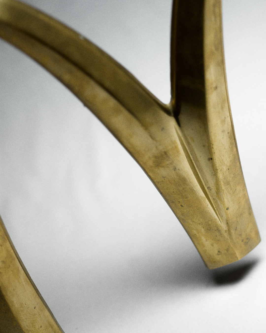 Vintage Italian McDonalds Sign in Brass — close-up of brass texture detail