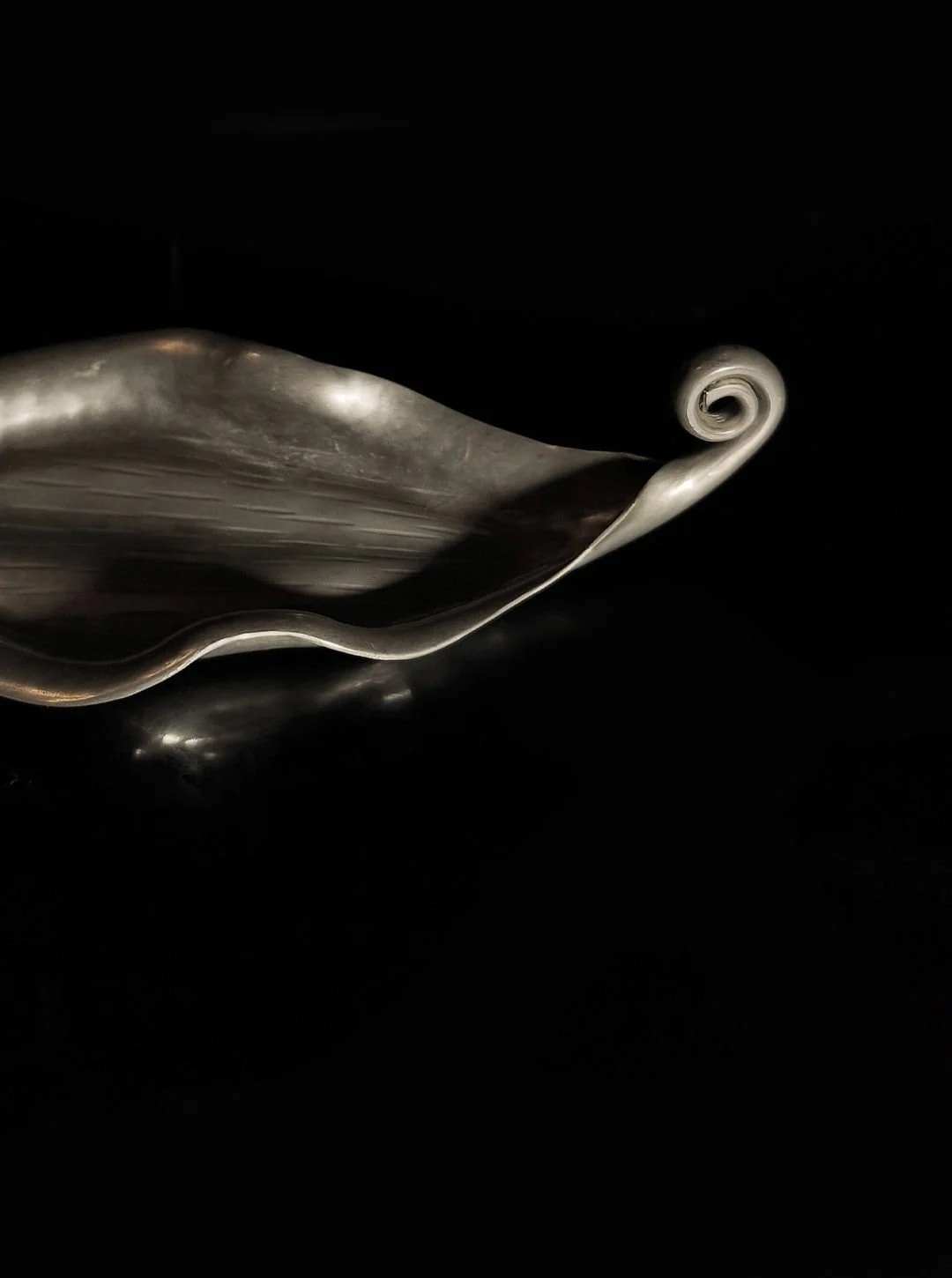 Pewter Leaf Vide Poche — close-up of curved pewter edge