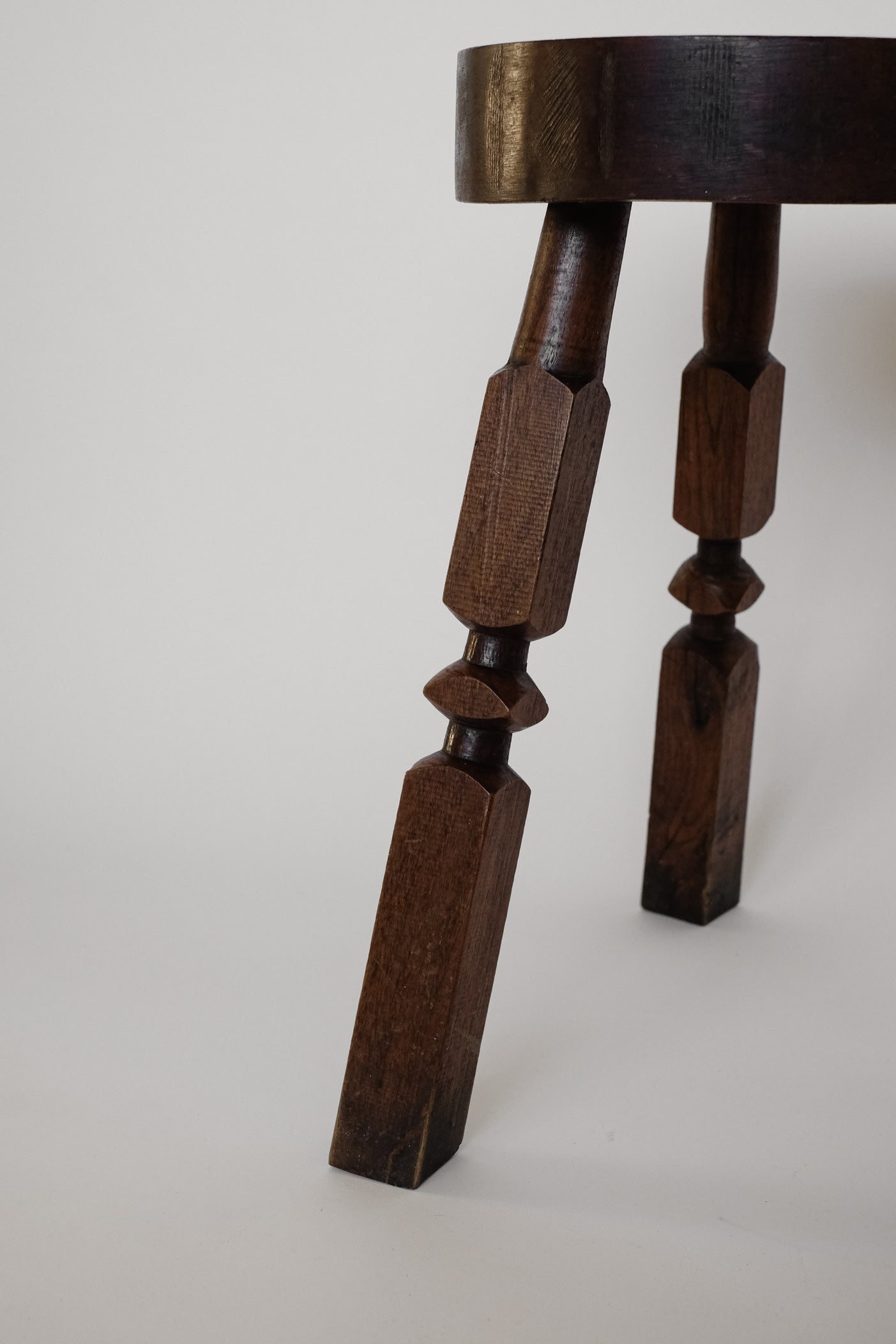 Pair of Mid-Century Rustic Tripod Stools — lifestyle setting