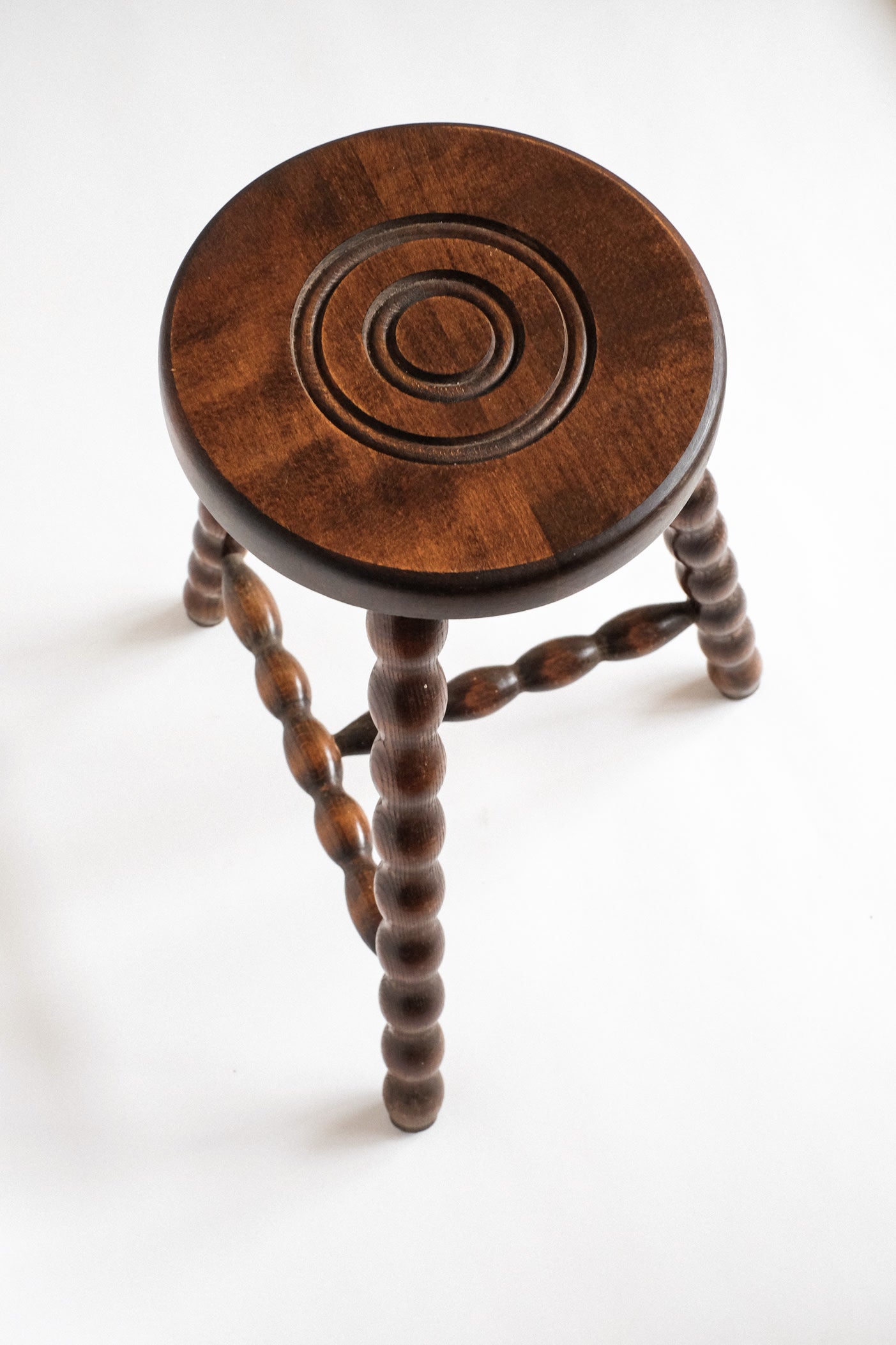 Charming Vintage French Bobbin Leg Wooden Stool — lifestyle setting