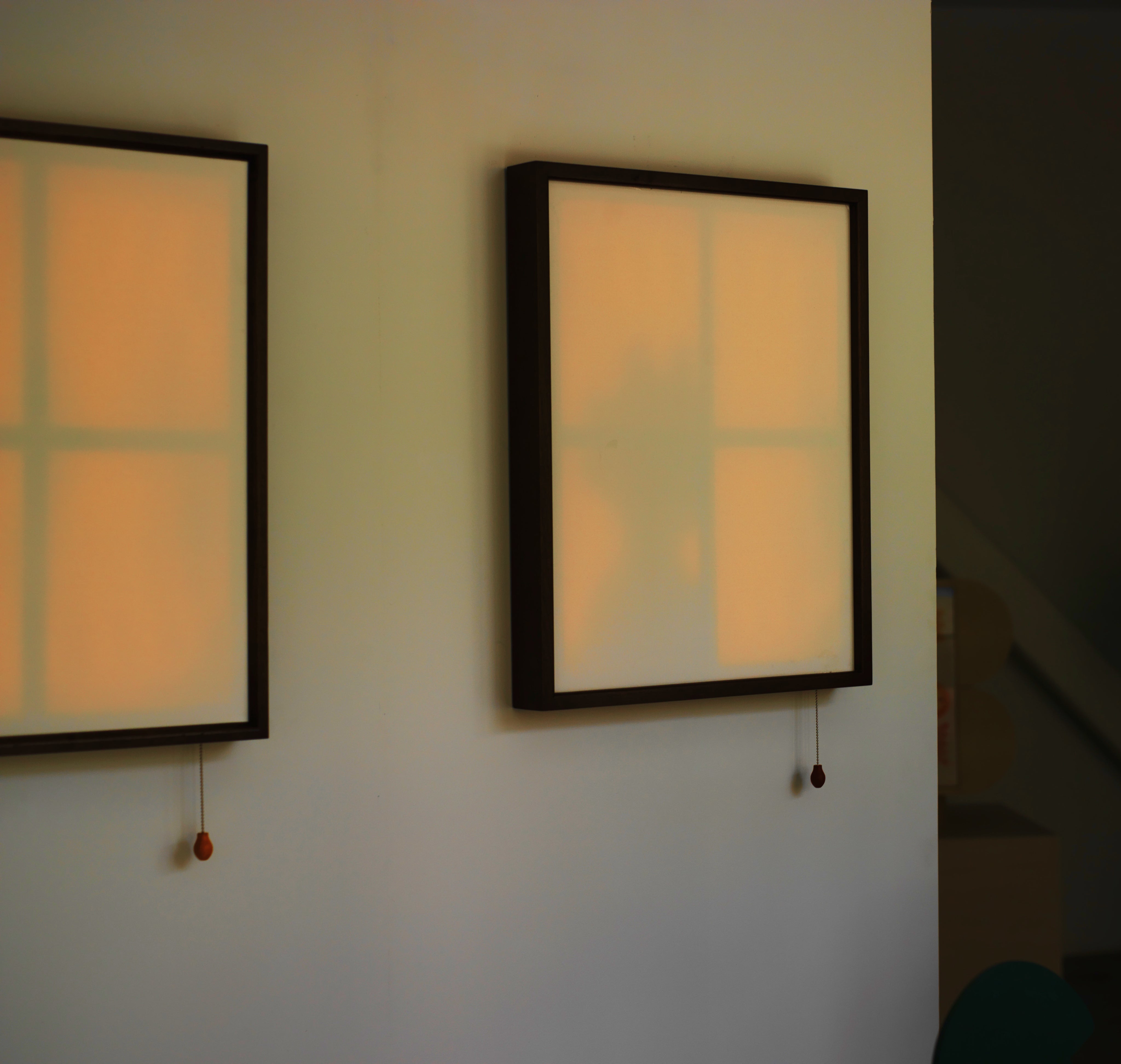 Cottage Window — wall light with warm glow in modern interior