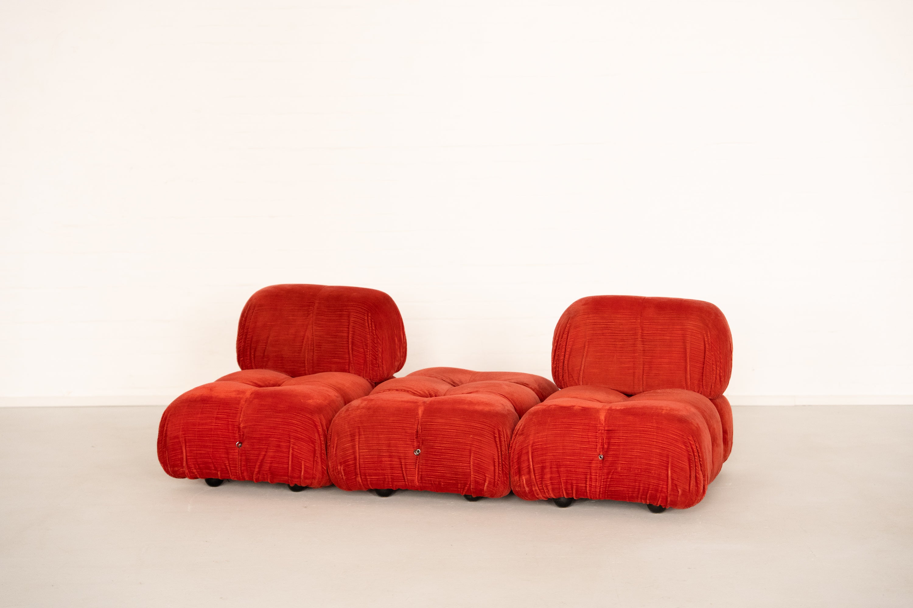 Camaleonda Modular Sofa by Mario Bellini for B&B Italia — side angle showing vibrant red upholstery