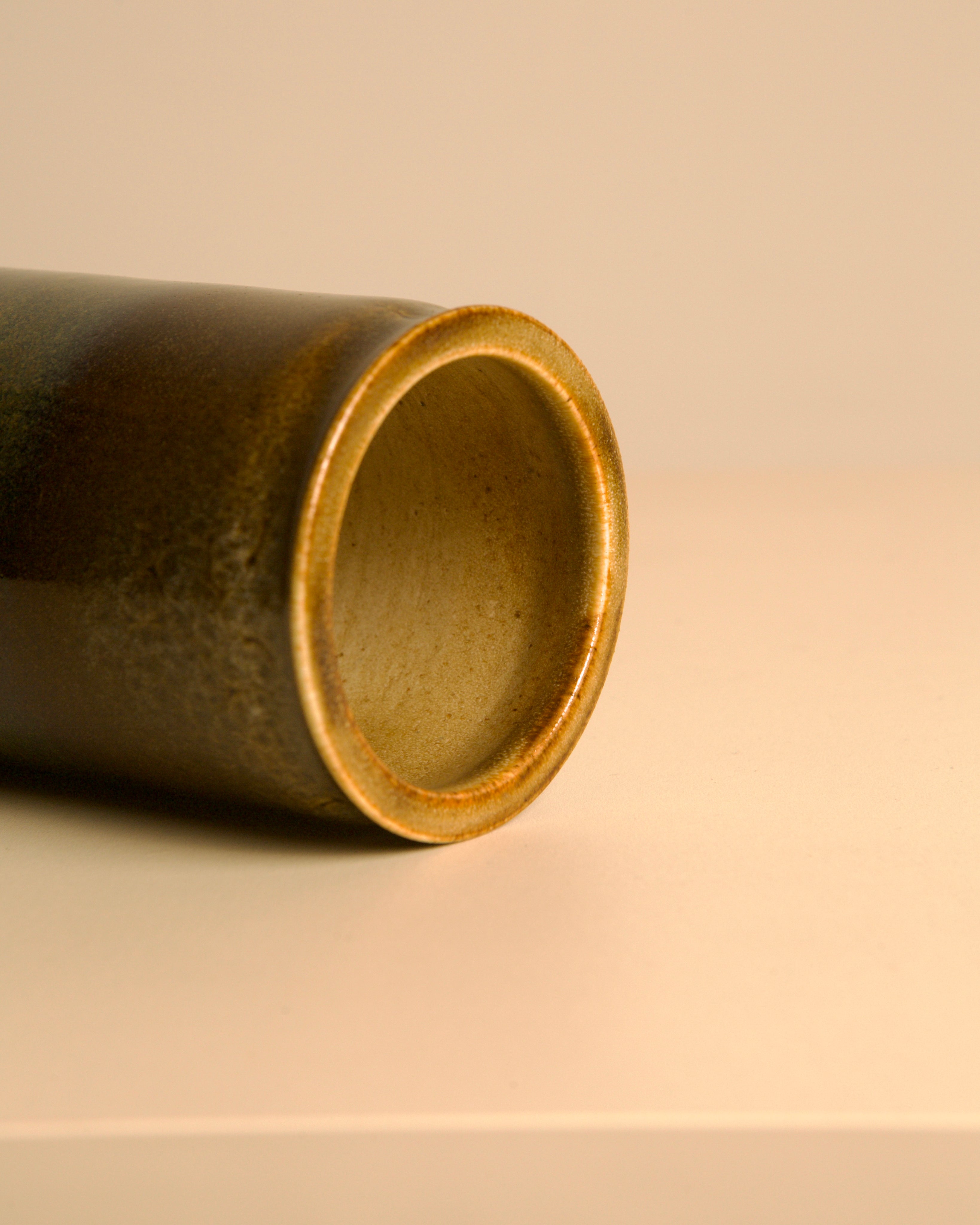 Interior view of tube stoneware vase showing hollow cylindrical form