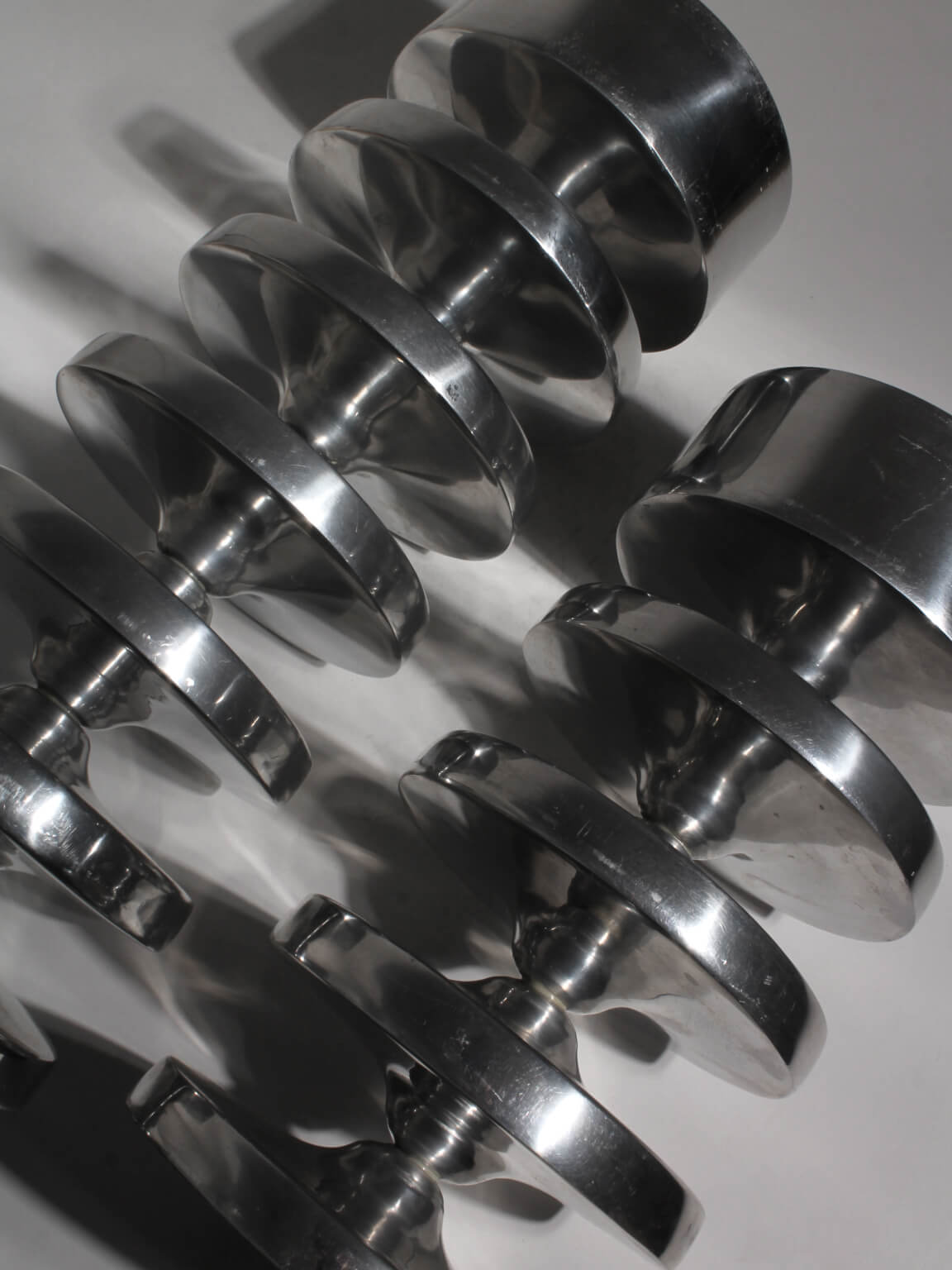 Pair Of Aluminum Contemporary Rimmed Stands — detail view