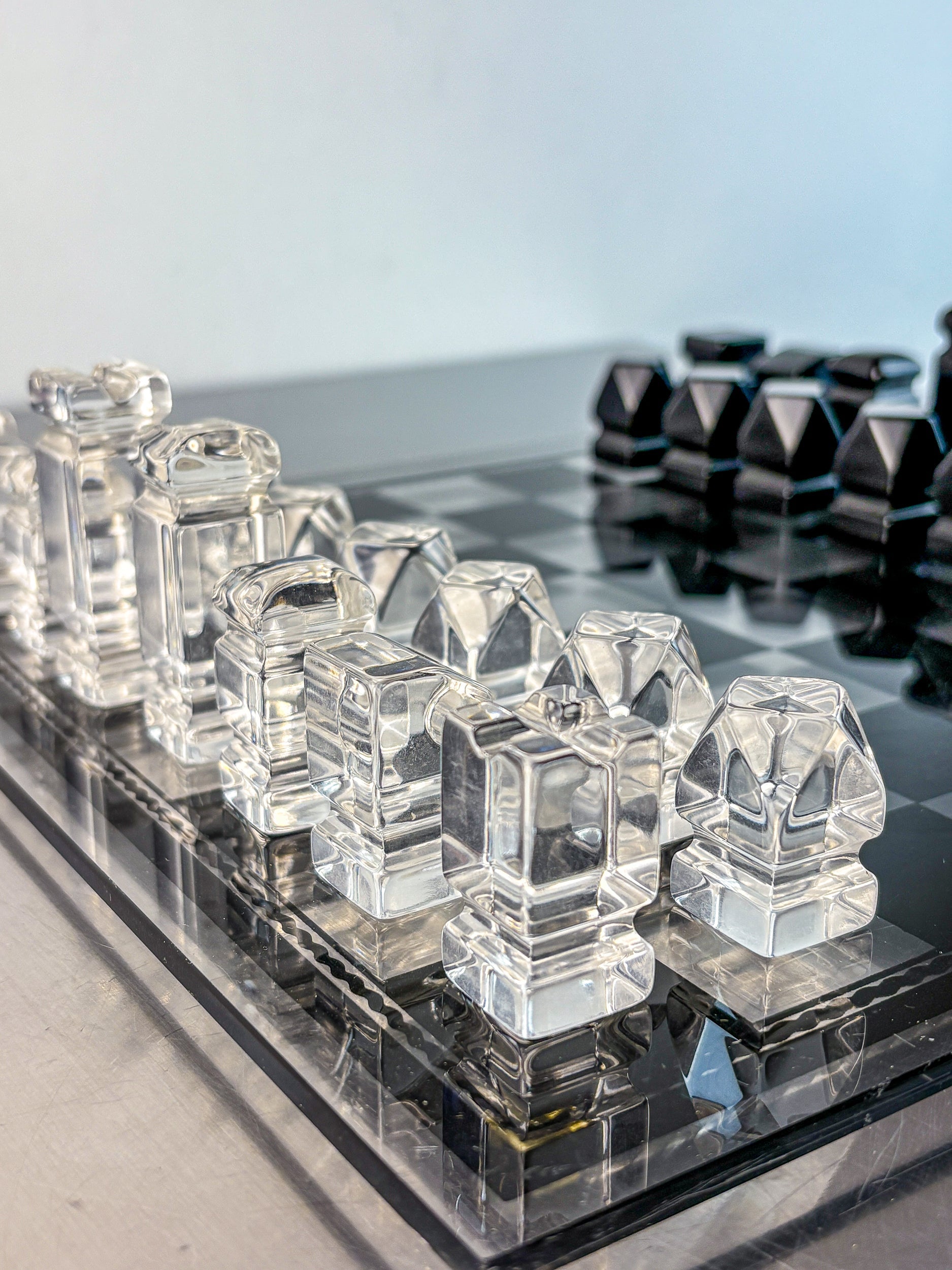 Felice Antonio Botta Acrylic Chessboard, Italy, 70s — top view of clear acrylic pieces on board