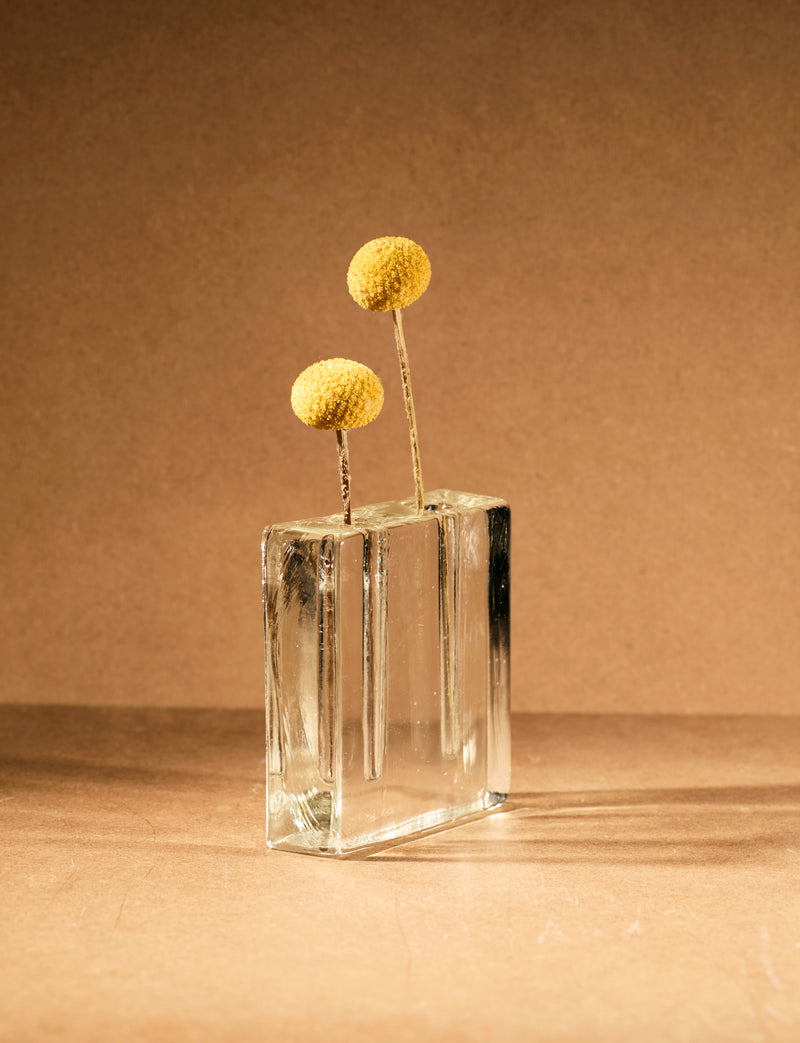 Vintage Scandinavian Clear Vase in Glass c. 1960 — close-up with yellow flowers in glass