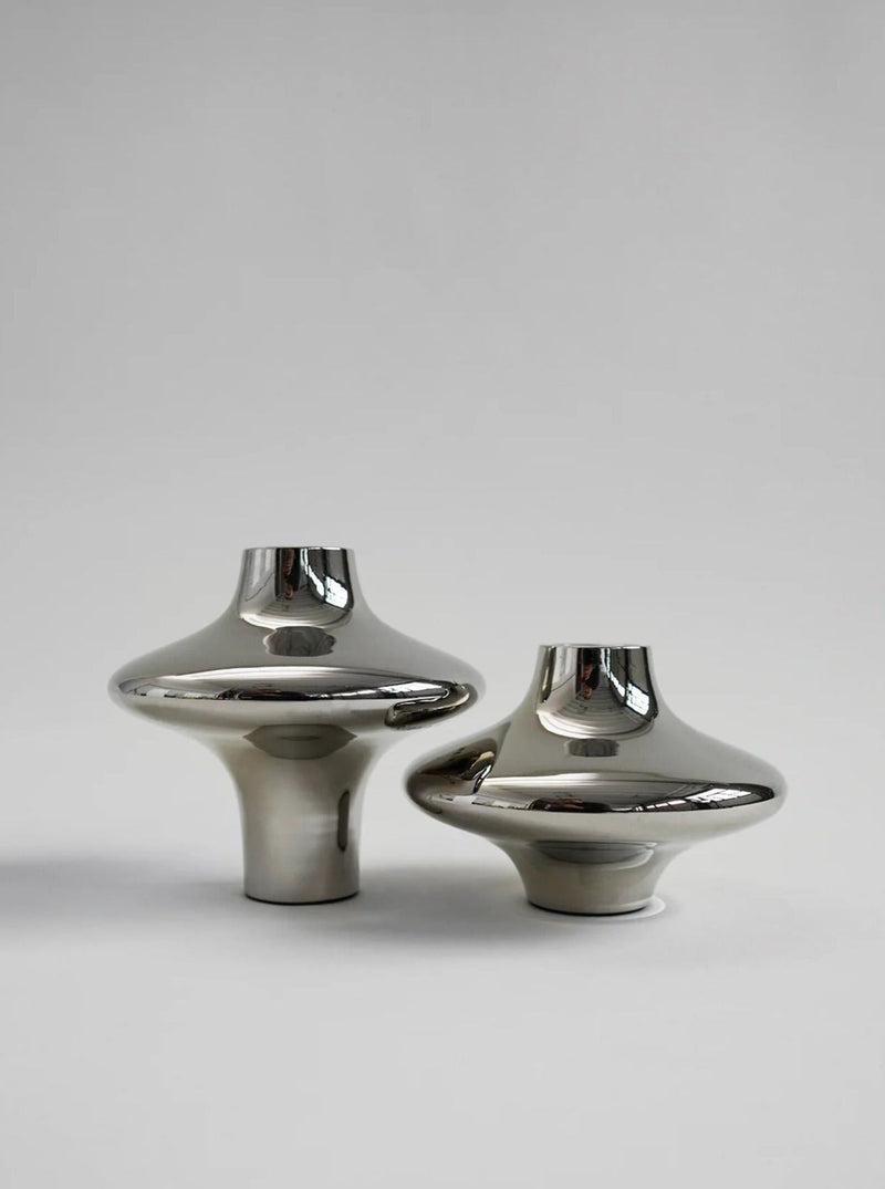 Doublet Candleholder - Large - Silver — close-up of polished silver surface