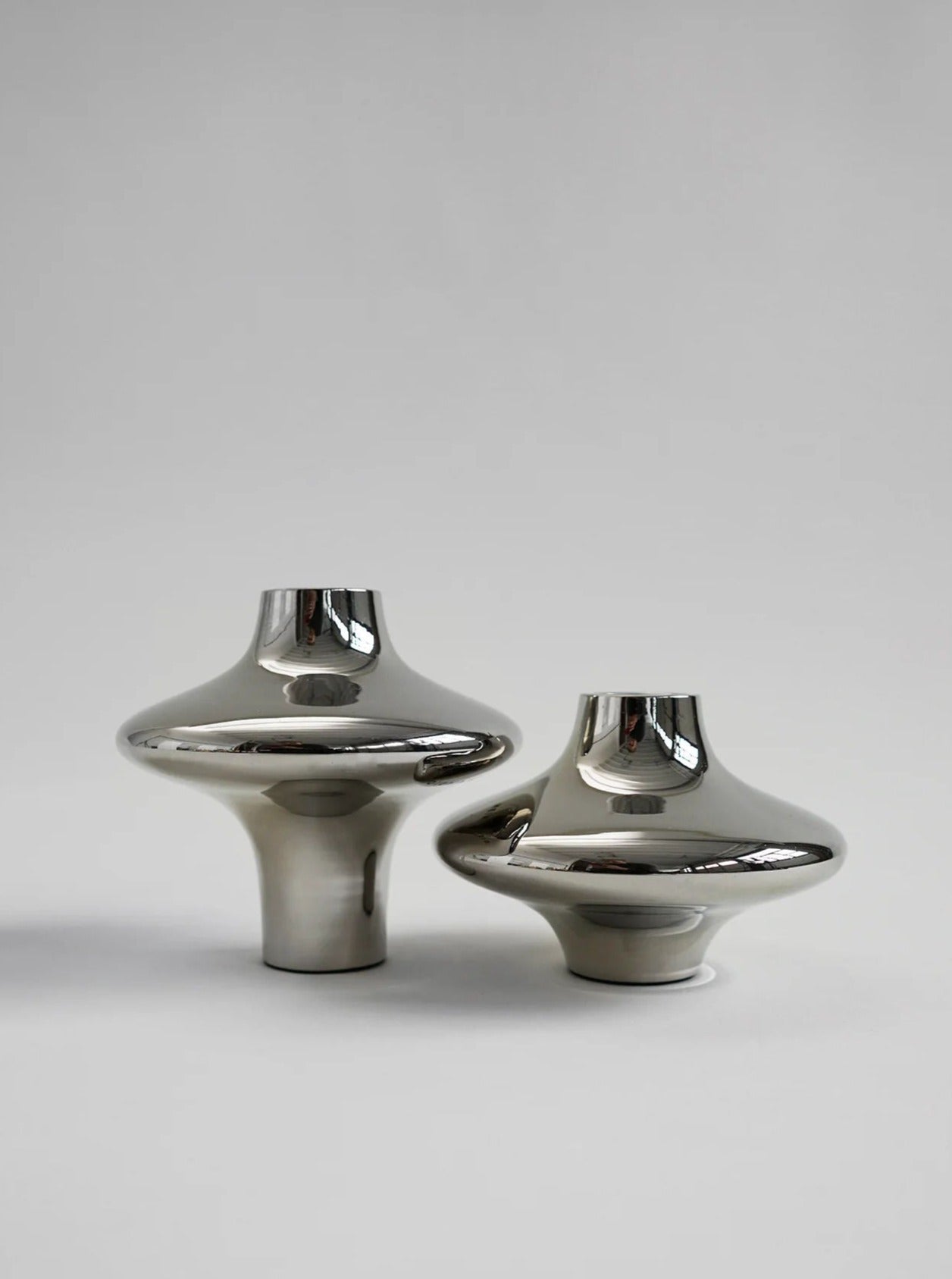 Doublet Candleholder - Large - Silver — close-up of polished silver surface