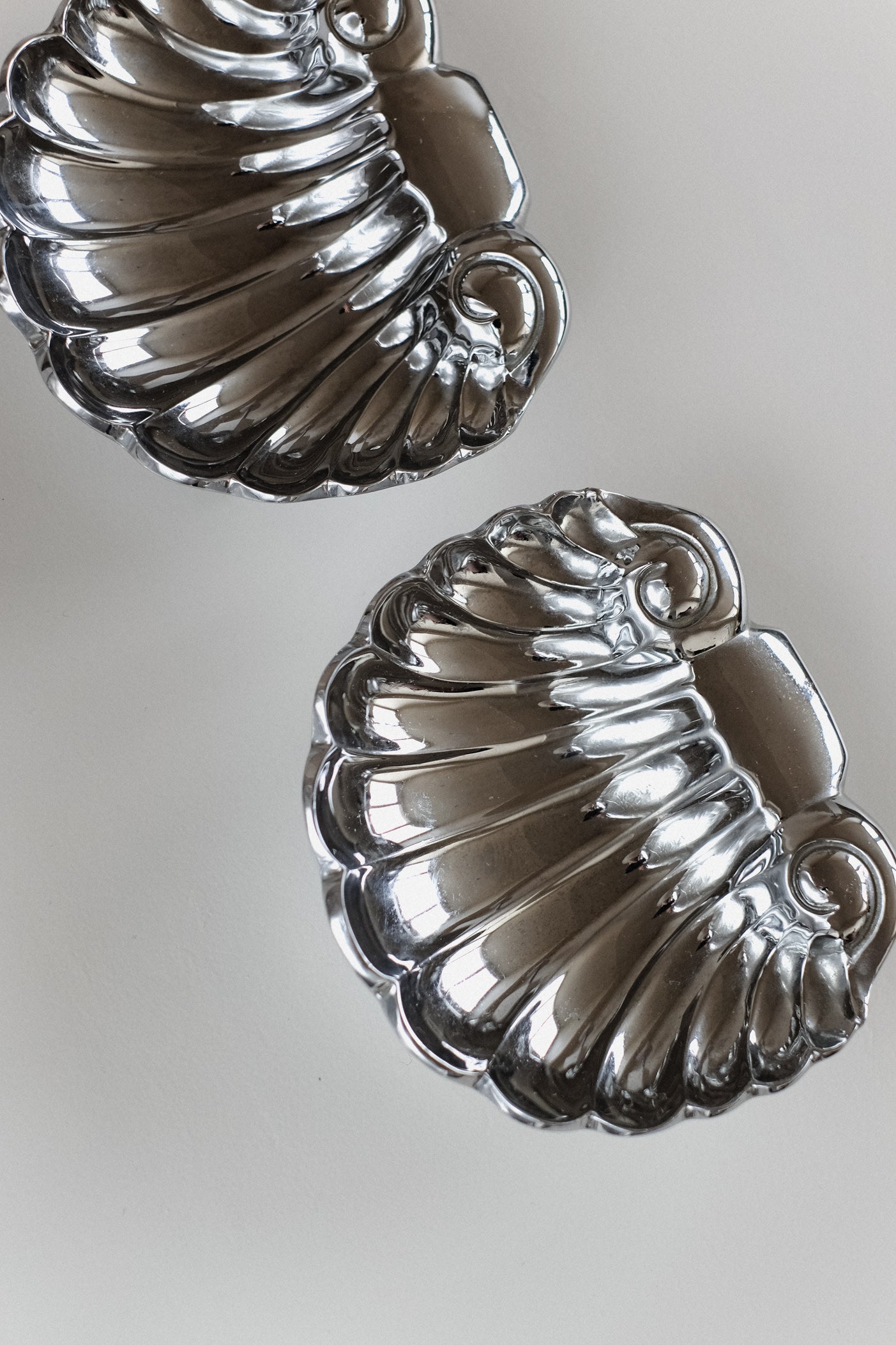 Set of 2 Shell Decorative Bowls — close-up of shiny silver finish