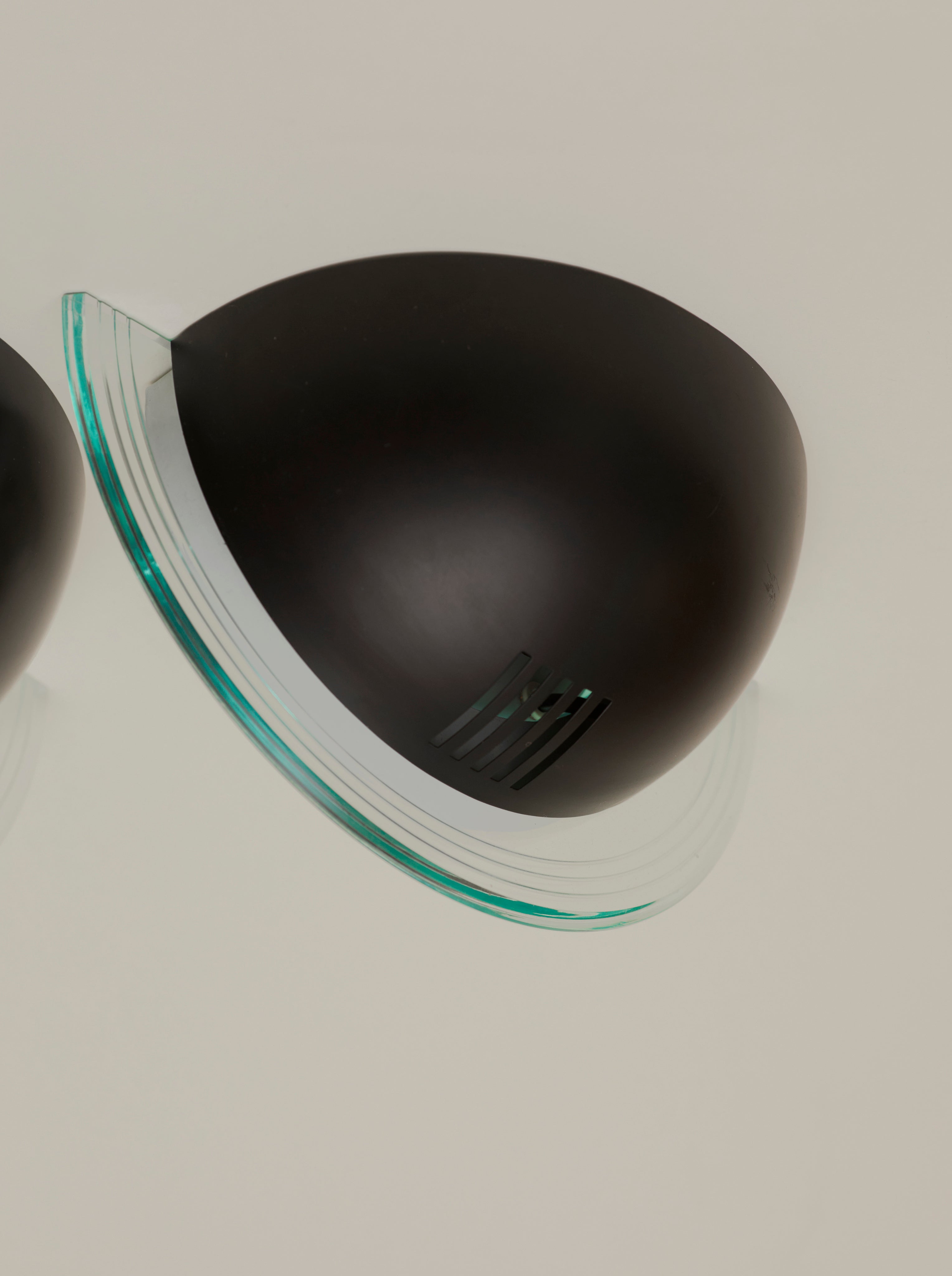 Set of 2 Vintage German Postmodern Wall Lights Circa 1980 — top view showing black and clear glass design
