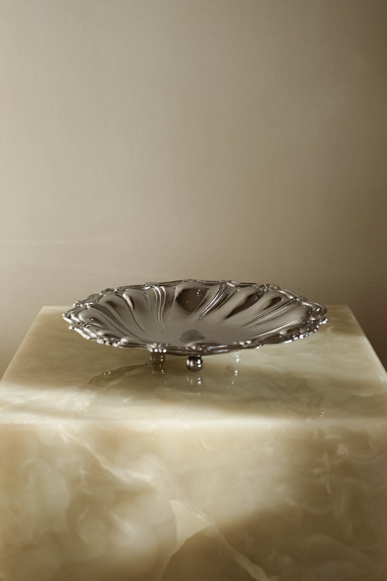 Italian Decorative Bowl — side angle on marble pedestal