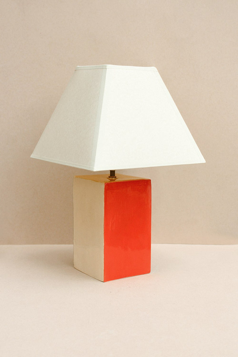 Paloma Lamp (Multi) — close-up of red and cream ceramic base