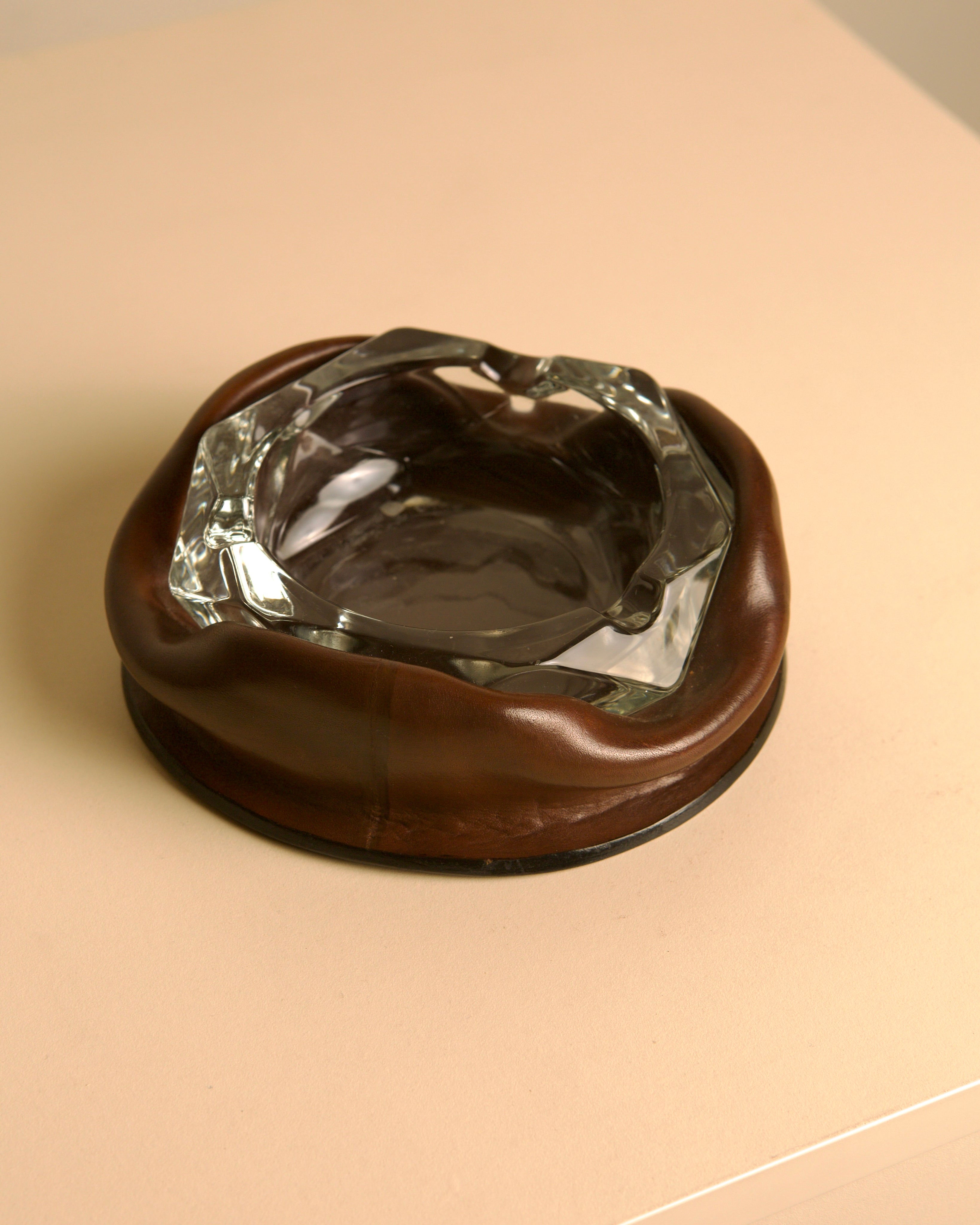 60s Italian brown leather glass ashtray — close-up