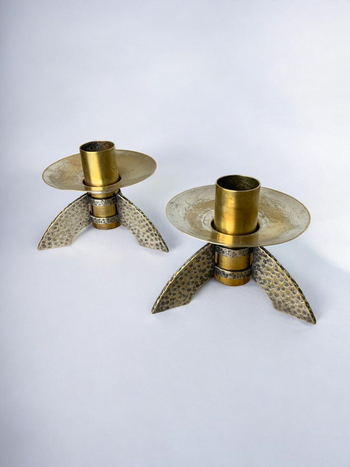 Pair of Brutalist candlesticks in brass, Denmark, 1970's — lifestyle setting