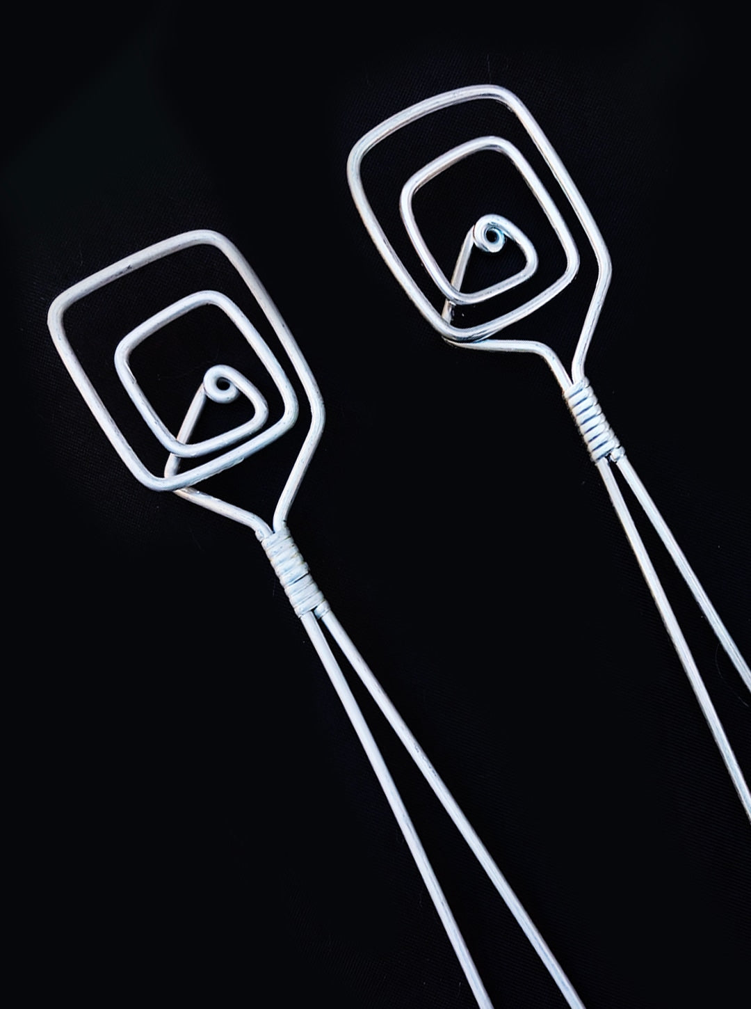 80's Salad Servers — close-up of white metal spiral design