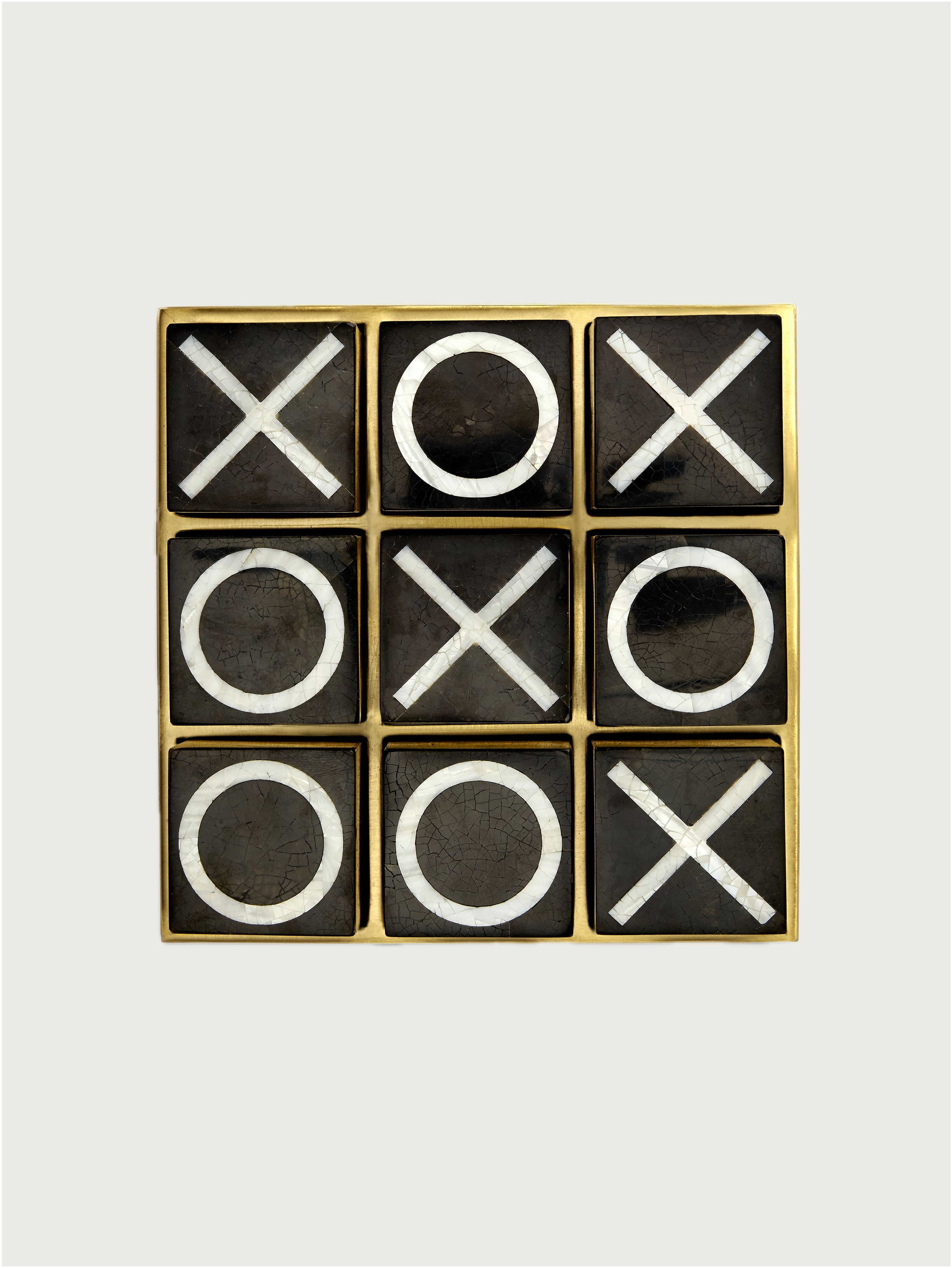 Deco Tic Tac Toe — top view of brass and black game board