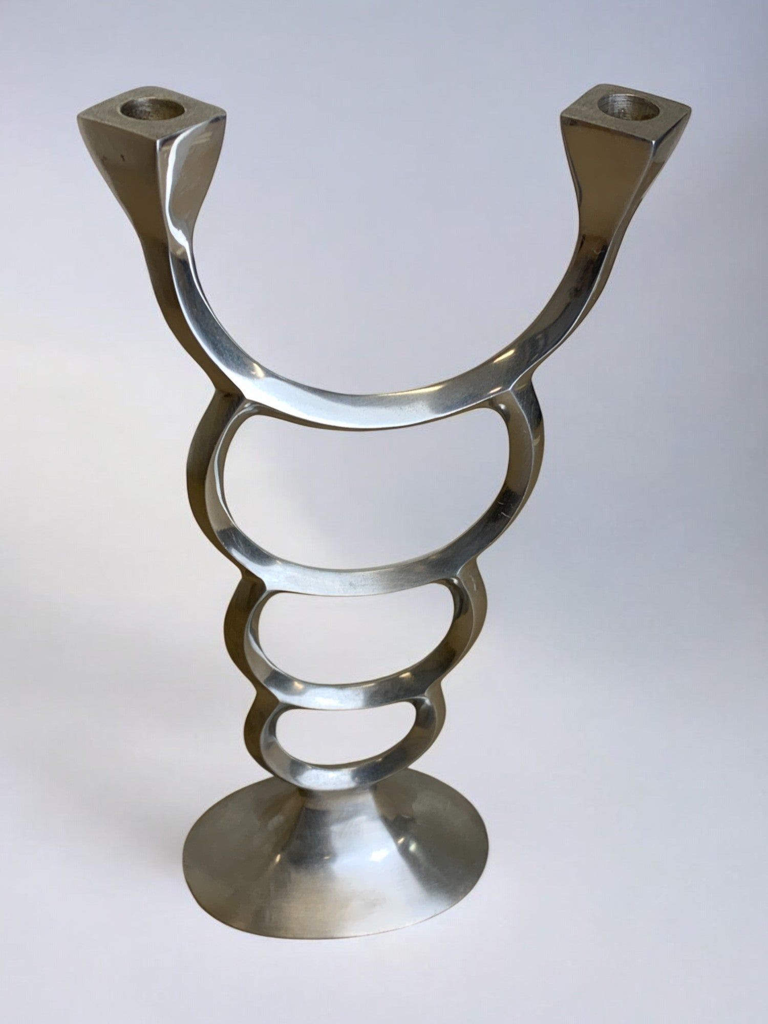 Biomorphic Candleholder, Spain, 1970s — close-up of polished metal surface
