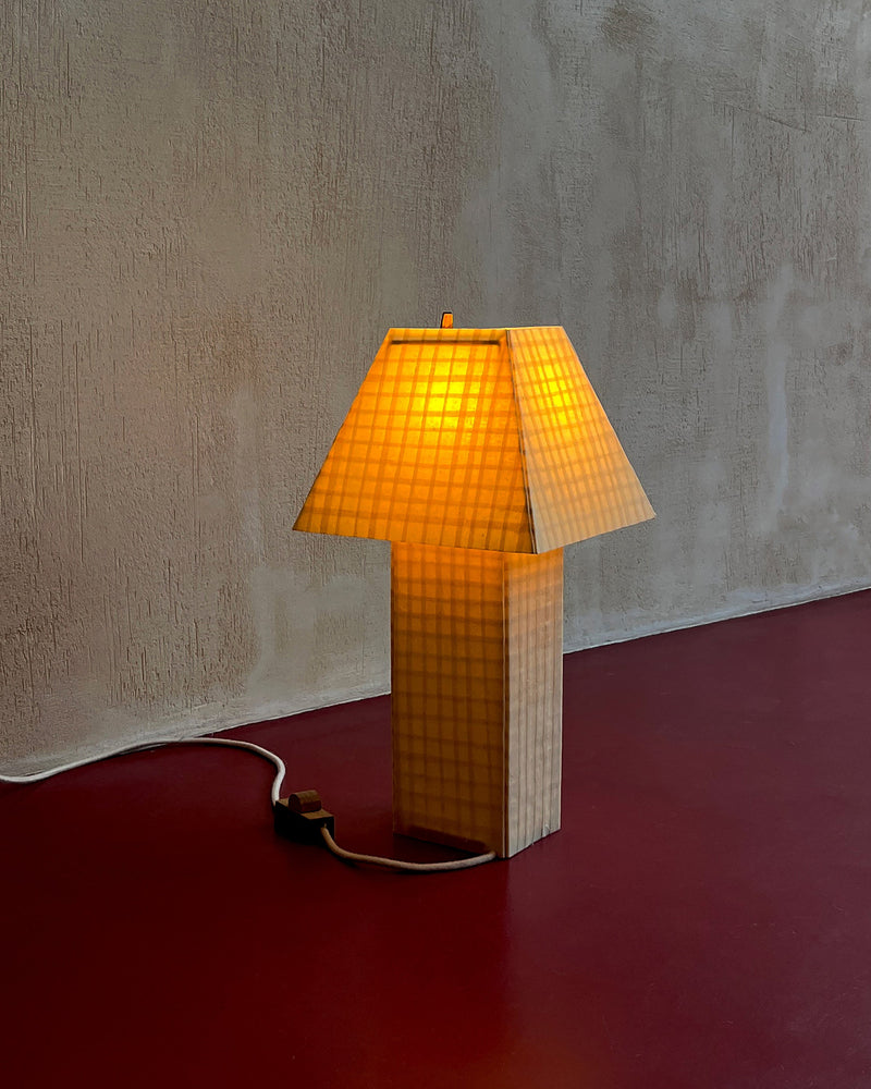 Illuminated Grid table lamp showing geometric pattern detail