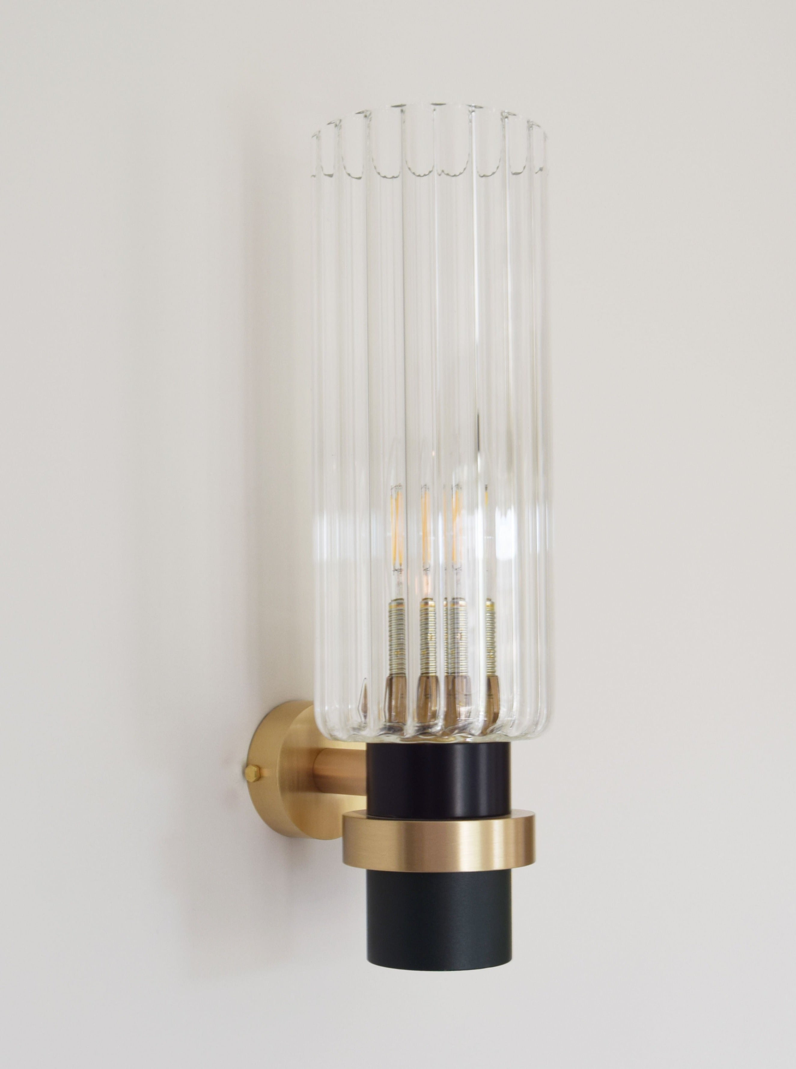 Magda Wall Light — top view of glass and brass design