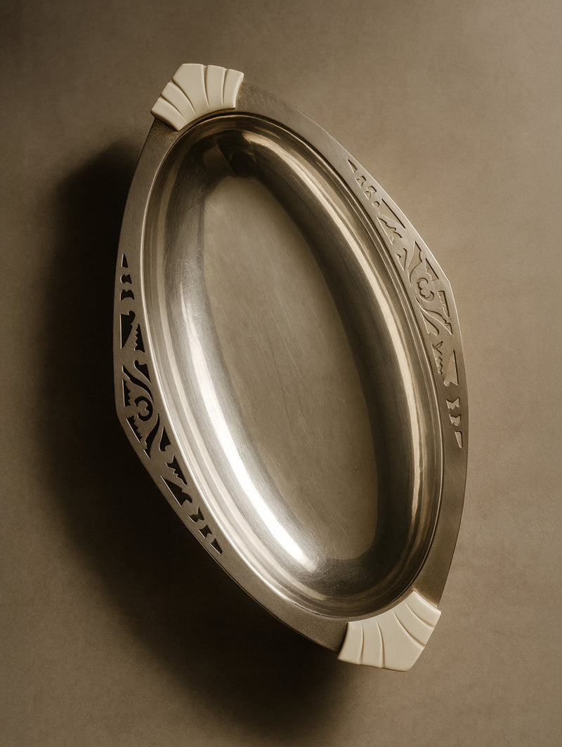 Art Deco oval serving plate with decorative Bakelite handles 1930s
