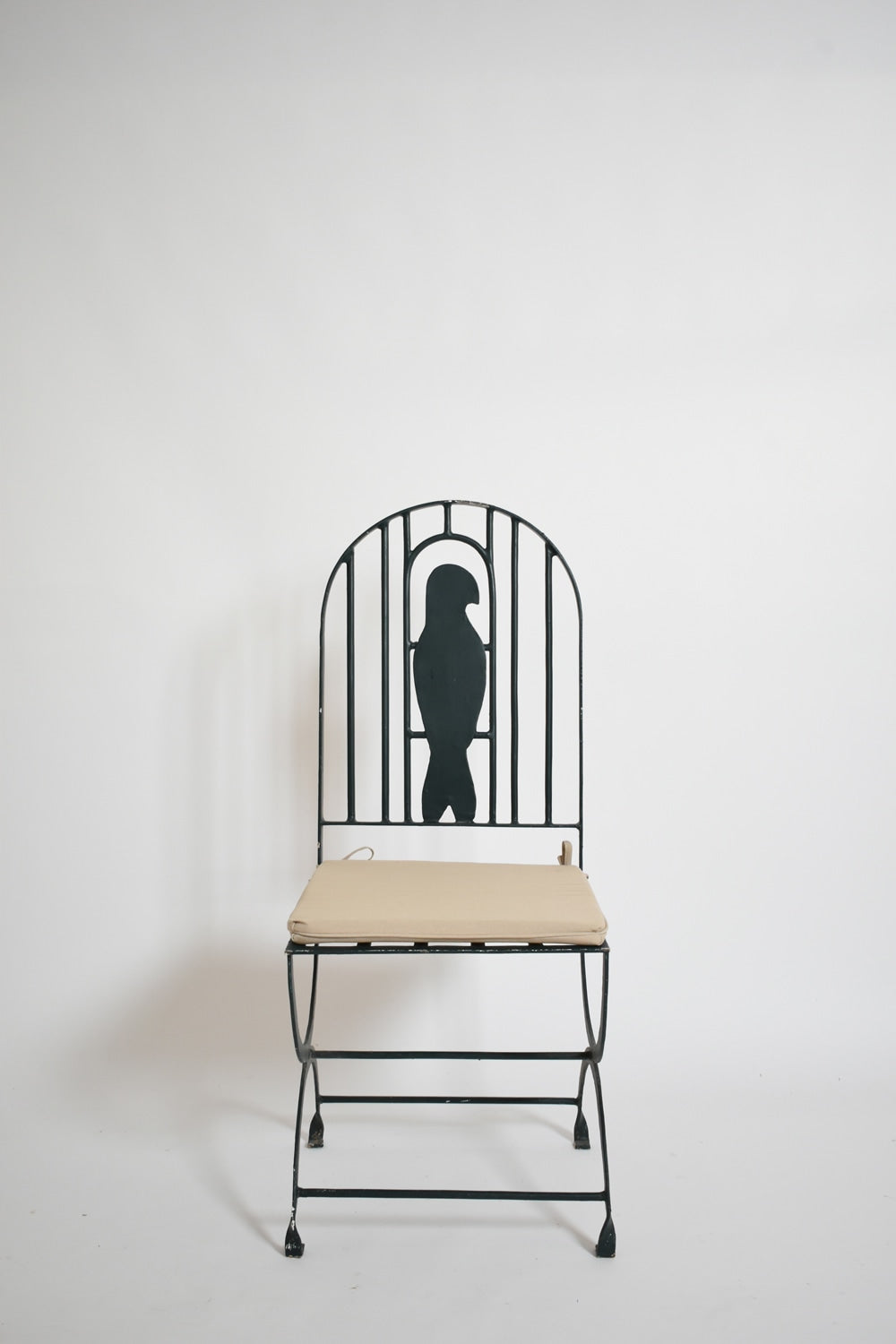 Pair of wrought iron bird cage chairs, 1960s. — lifestyle setting