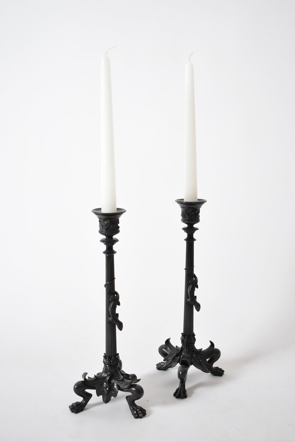 Set of four tripod zoomorphic bronze candleholders, XIXth c. — side angle