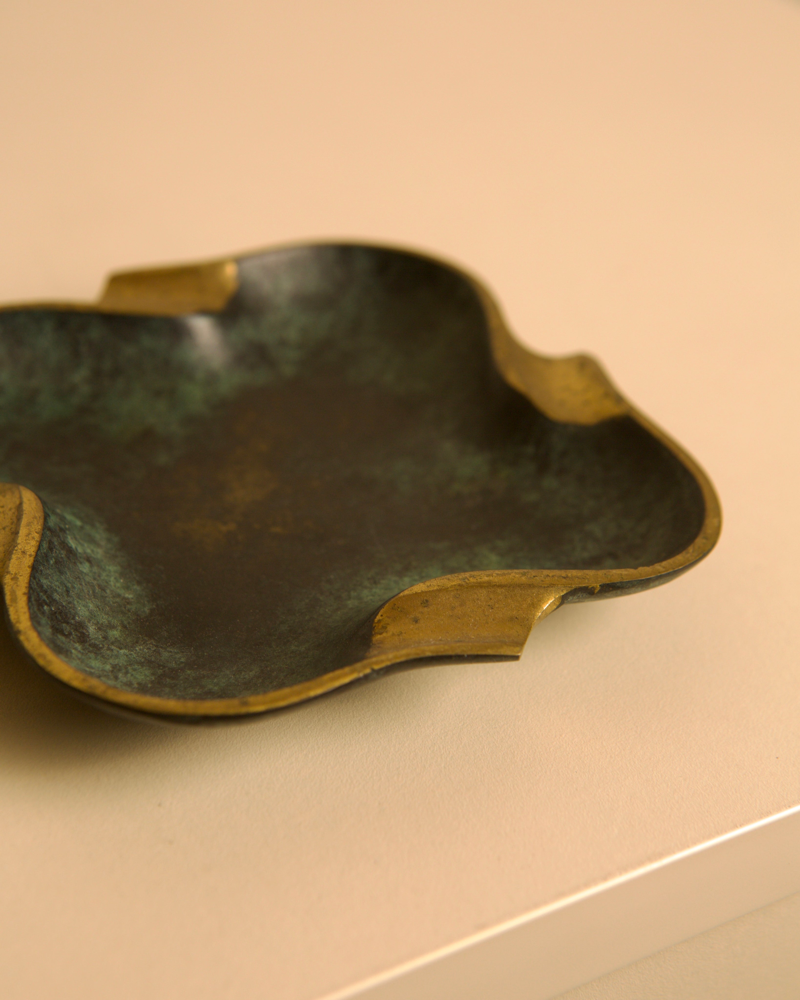 Italian Bronze Ashtray, 1940s — angled view on neutral surface