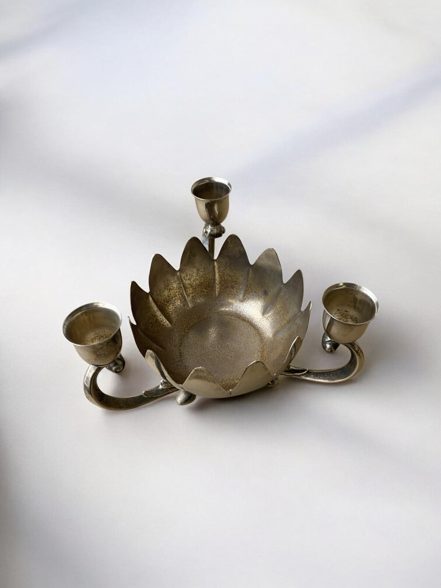 Art deco waterlily Candelholders, France, 1960's — top view on light background