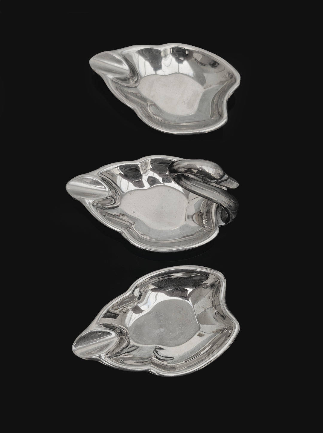 Set of Swan Ashtrays — side angle