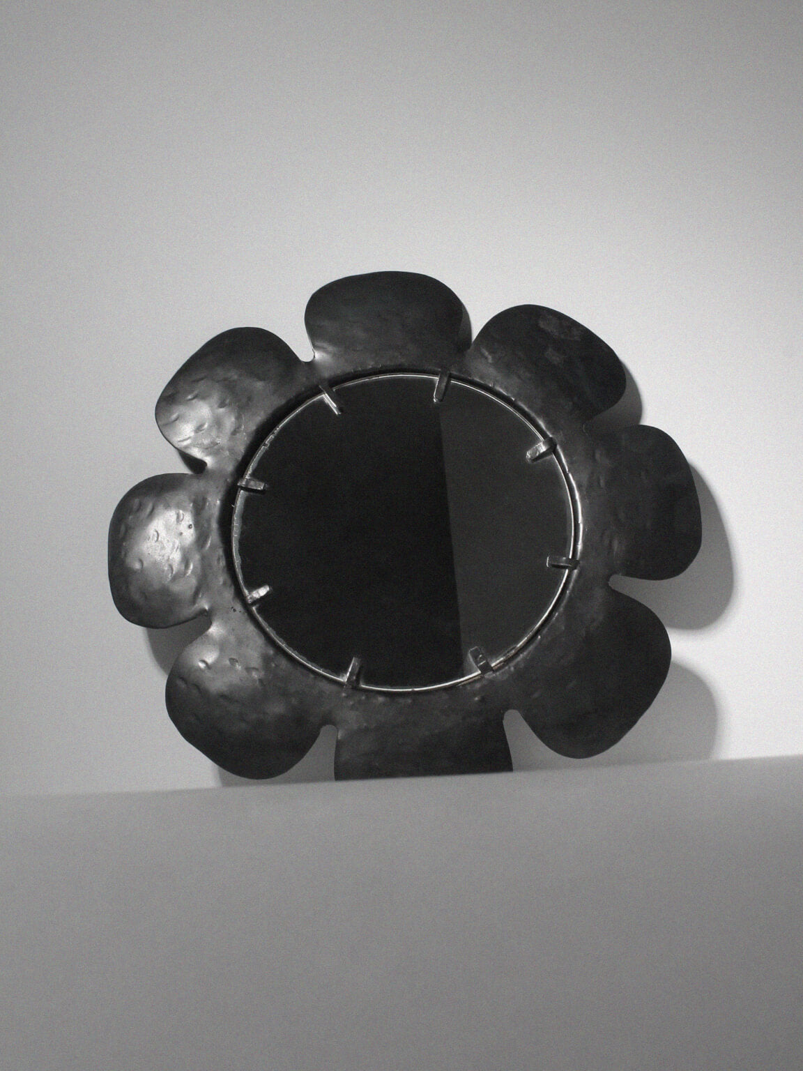 Vintage Eight Petal Hand Hammered Cast Iron Wall Mirror — detail view
