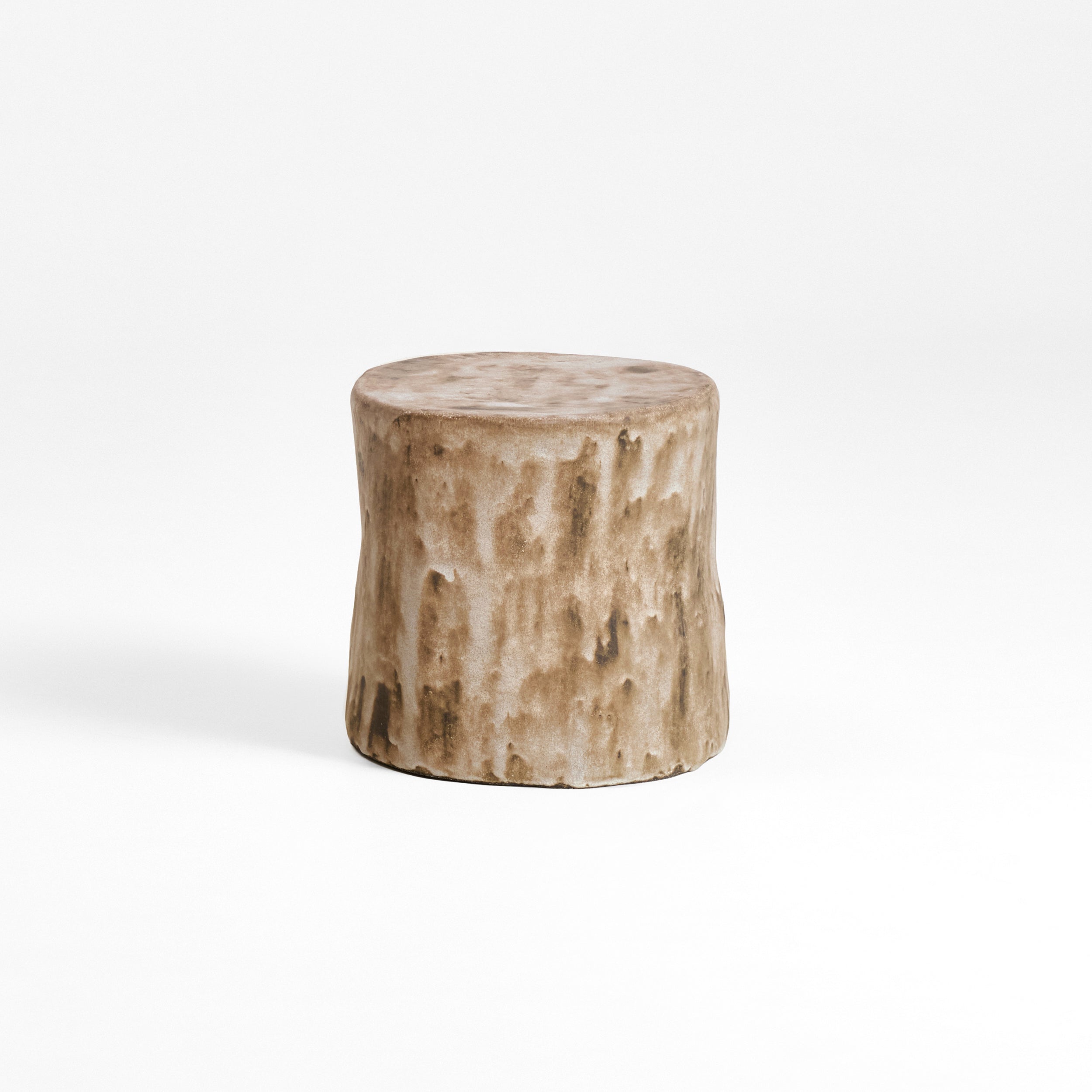 Ceramic Side Table (small) — side angle showing textured beige surface